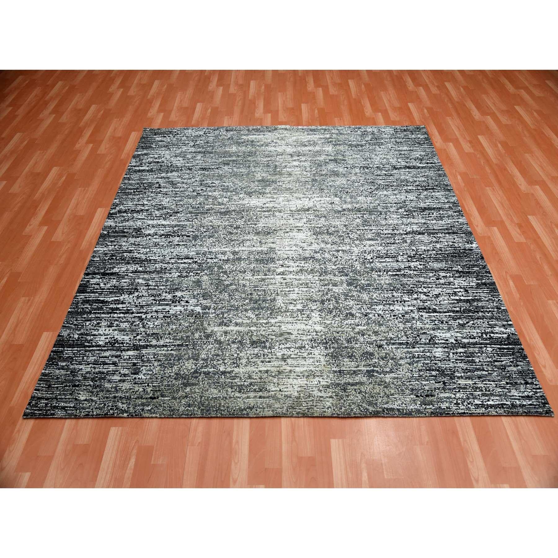 Negro con toques de gris, diseño de estrías anudado a mano, lana y seda pura, alfombra oriental cuadrada
Materiales primarios: Lana y seda
Látex: Sin pelo 
altura: 0,25 Pulgadas
Estilo: Casual
Color principal: Negro
Colores secundarios: Marfil, Gris