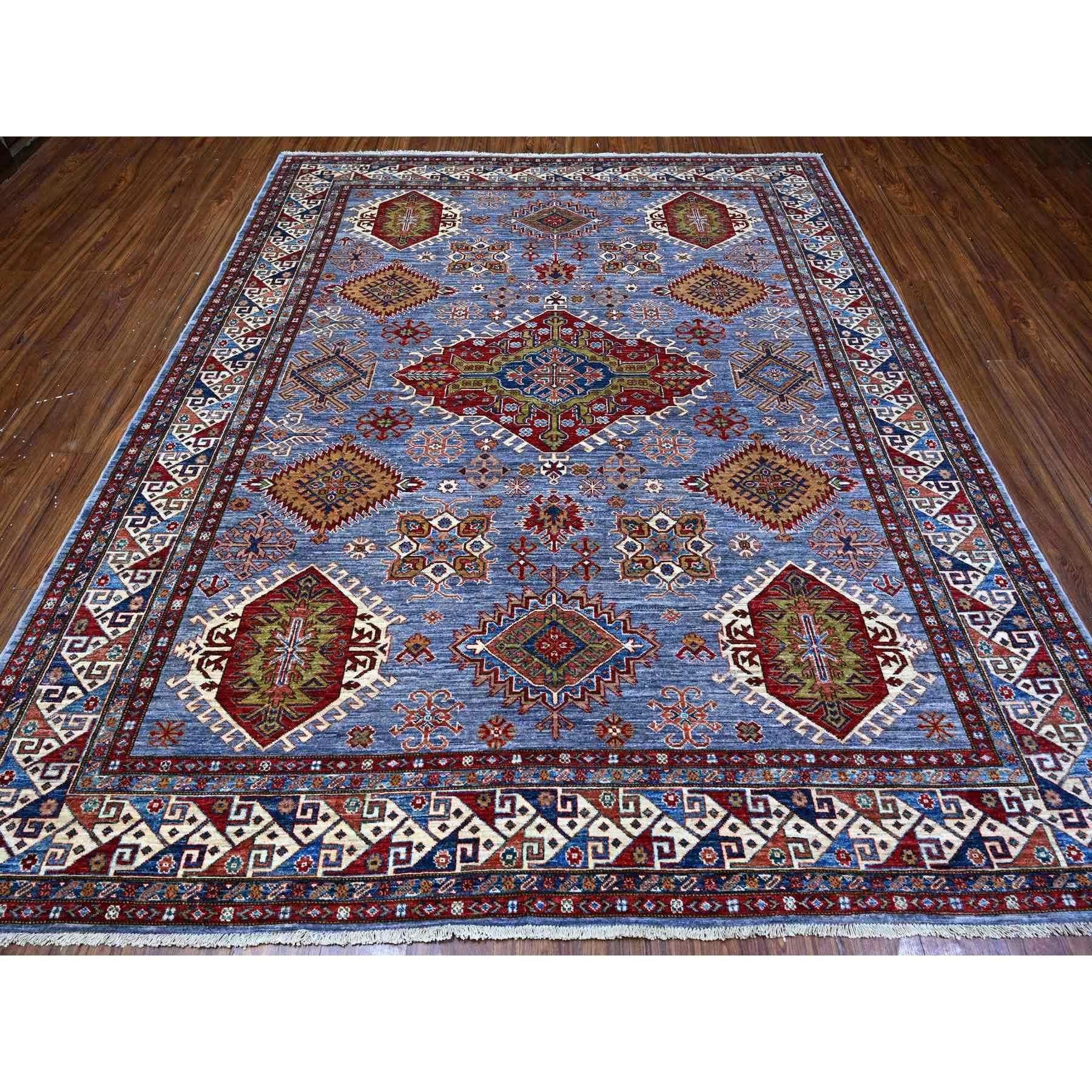 This is a truly genuine one-of-a-kind Afghan Super Kazak, Hand Knotted, Pure Wool, Oriental Rug. It has been Knotted for months and months in the centuries-old weaving craftsmanship techniques by expert artisans.
Primary materials: Wool
Latex: No