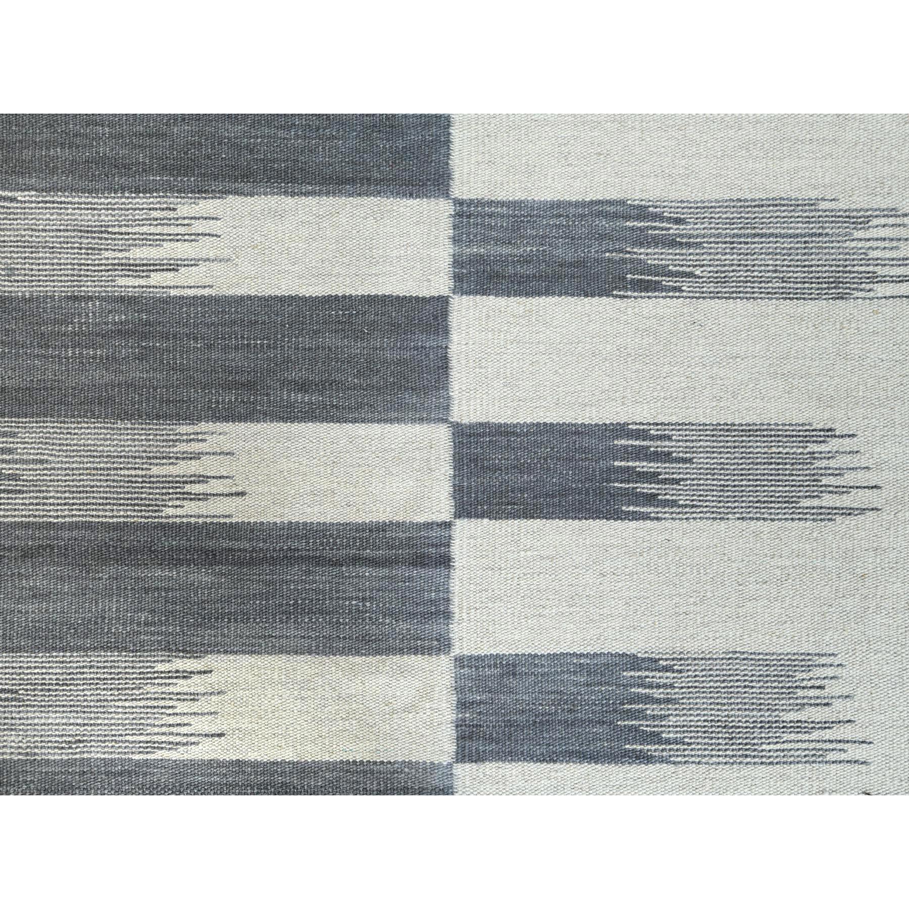 This is a truly genuine one-of-a-kind Hand Woven Avant-Garde Stripe Design Flat Weave Kilim Organic Wool Reversible Oriental Rug. It has been Woven for months and months in the centuries-old weaving craftsmanship techniques by expert