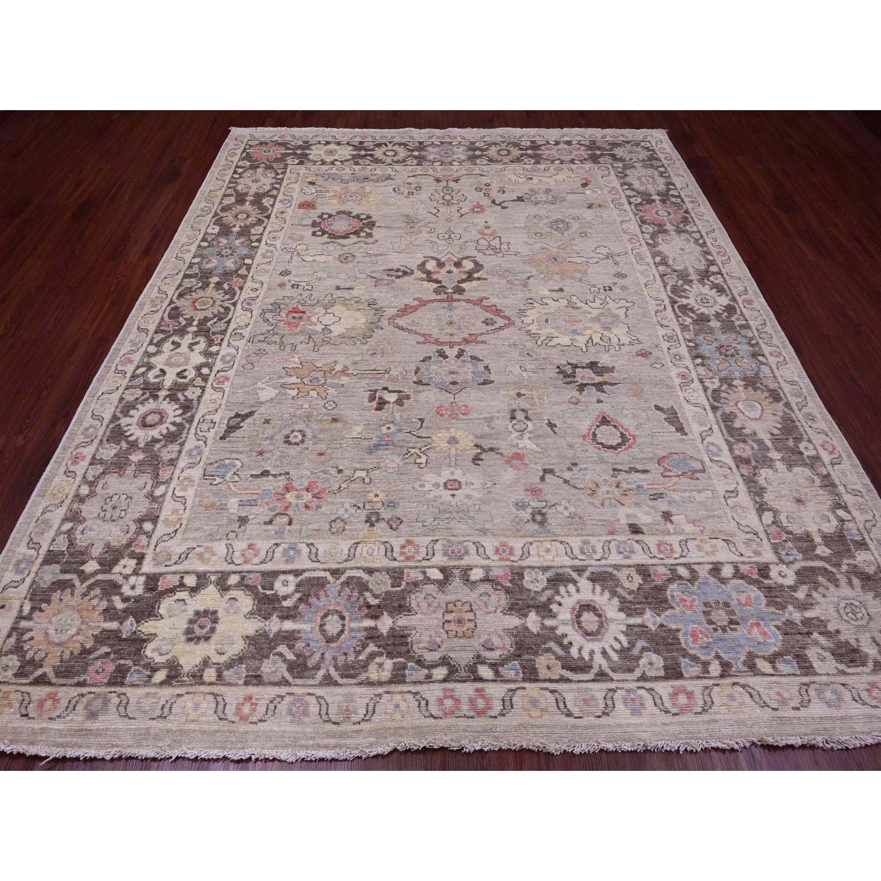 Beaver Brown, Leaf Design, Afghan Angora Oushak, Natural Dyes, Pure Wool, Hand Knotted, Oriental Rug
Primary materials: Wool
Latex: No Pile 
height: 0.25 Inches
Style: Transitional
Primary color: Brown
Secondary colors: Red, Blue, Ivory,