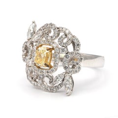 .83 Carat Fancy Yellow Cushion Diamond Flower Shaped Ring 18 Karat
