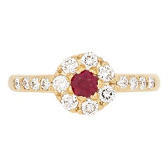 .83 Carat Round Cut Ruby and Diamond Ring, 18 Karat Yellow Gold Floral Halo