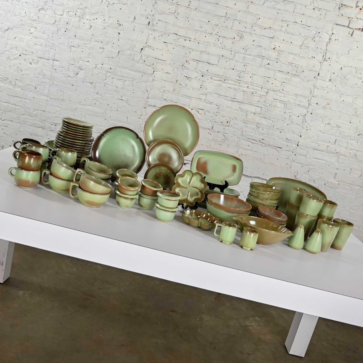 Outstanding vintage Frankoma 83-piece dinnerware set in patterns of Plainsman, Lazybones, & Westwinds with green & prairie green two-tone glaze. Gorgeous condition, keeping in mind that these are vintage and not new so will have signs of use and