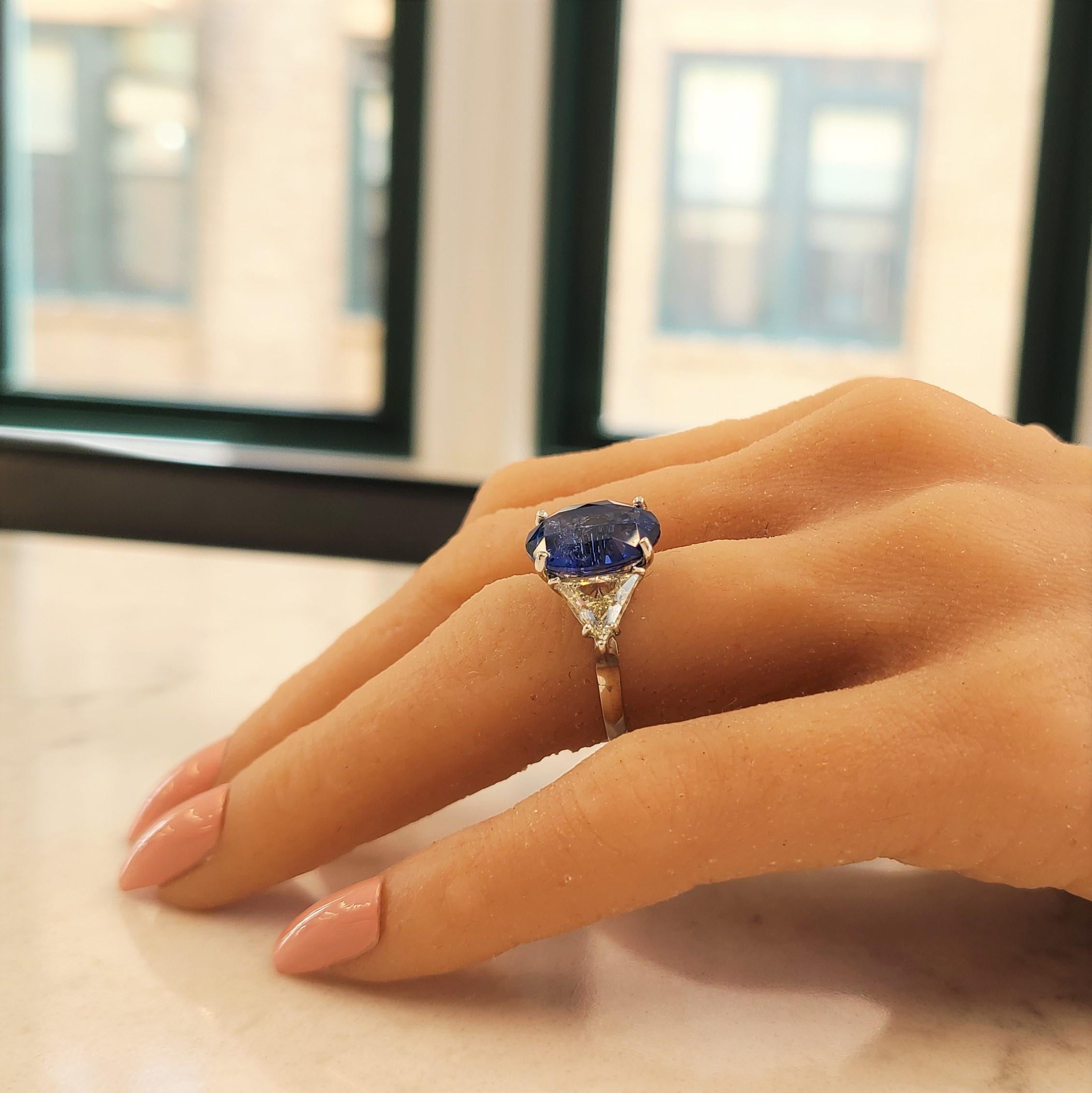 Contemporary 8.30 Carat Oval Blue Sapphire & Trillion Cut Diamond Ring in Platinum
