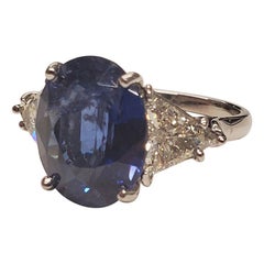 8.30 Carat Oval Blue Sapphire & Trillion Cut Diamond Ring in Platinum