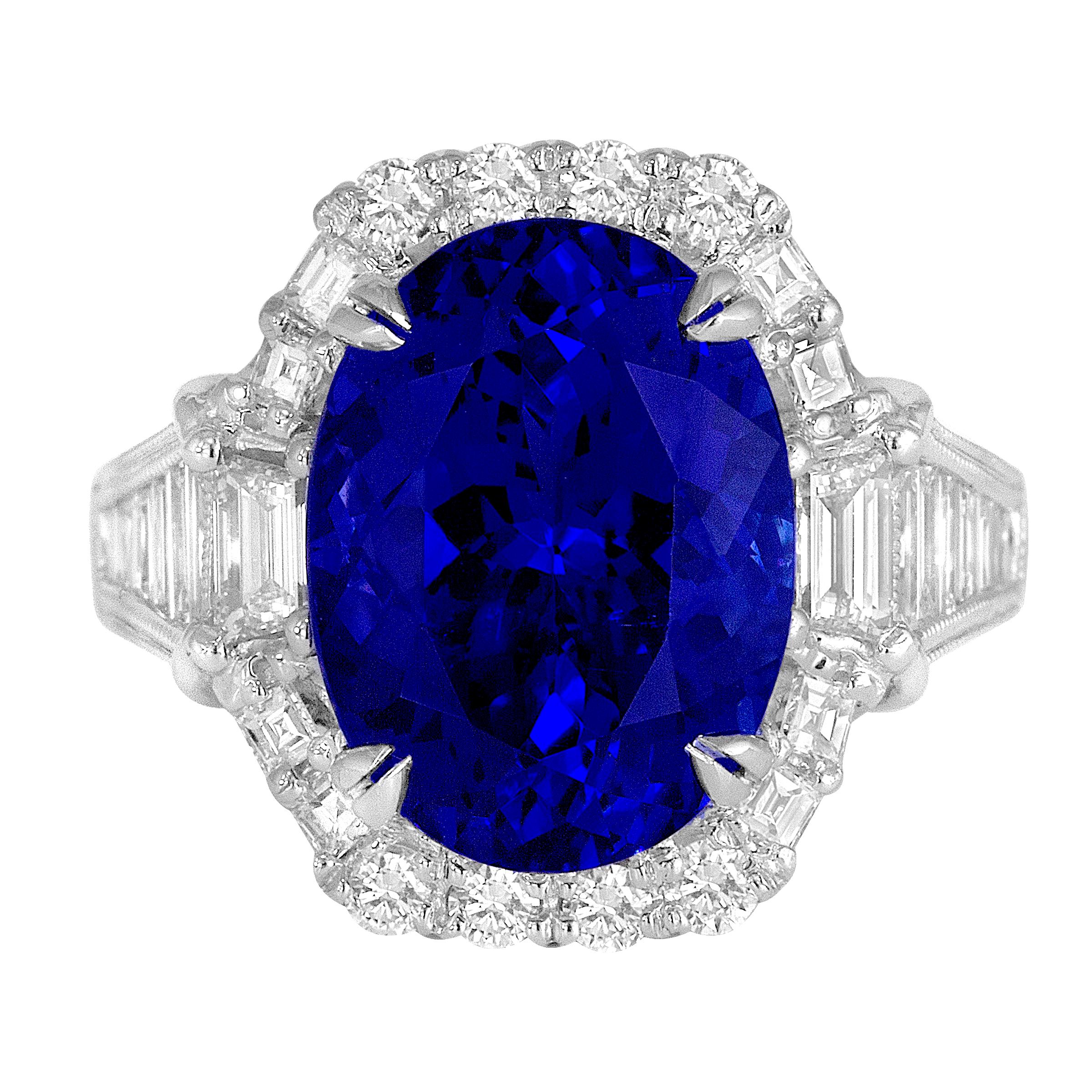 (DiamondTown) This gorgeous ring holds an 8.30 carat oval cut bluish violet Tanzanite center, surrounded by a halo of round and baguette diamonds. Additional baguette diamonds decorate the side shank.

Center: 8.30 Carat oval cut Tanzanite
Total