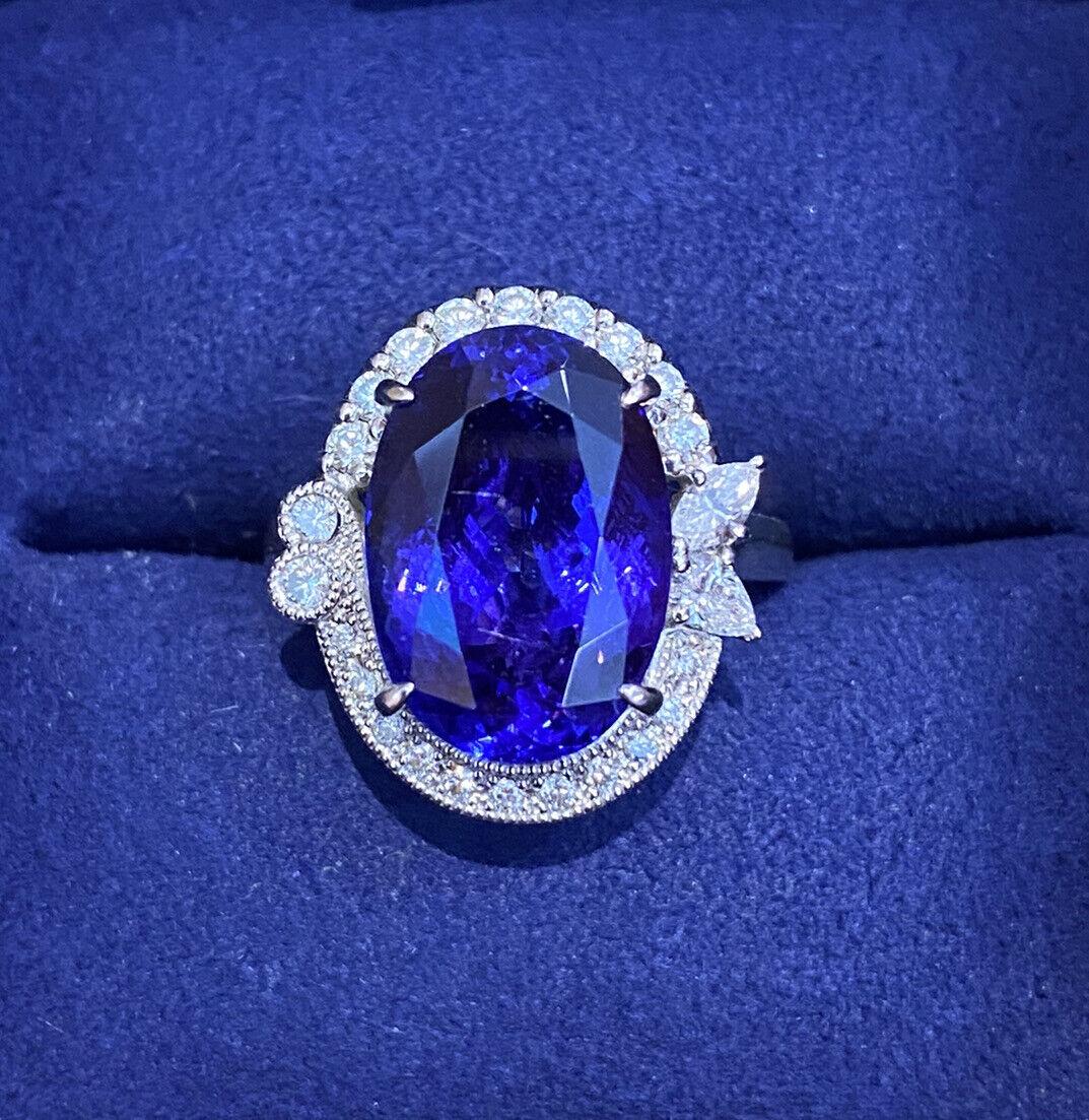 8.30 Carat Oval Tanzanite and Diamond Ring in Platinum

Tanzanite and Diamond Ring features an 8.30 carat Deep Blue-Purple Oval Tanzanite in the center, surrounded by Marquise, Pear, and Round Diamonds set in Platinum.

Total tanzanite weight is