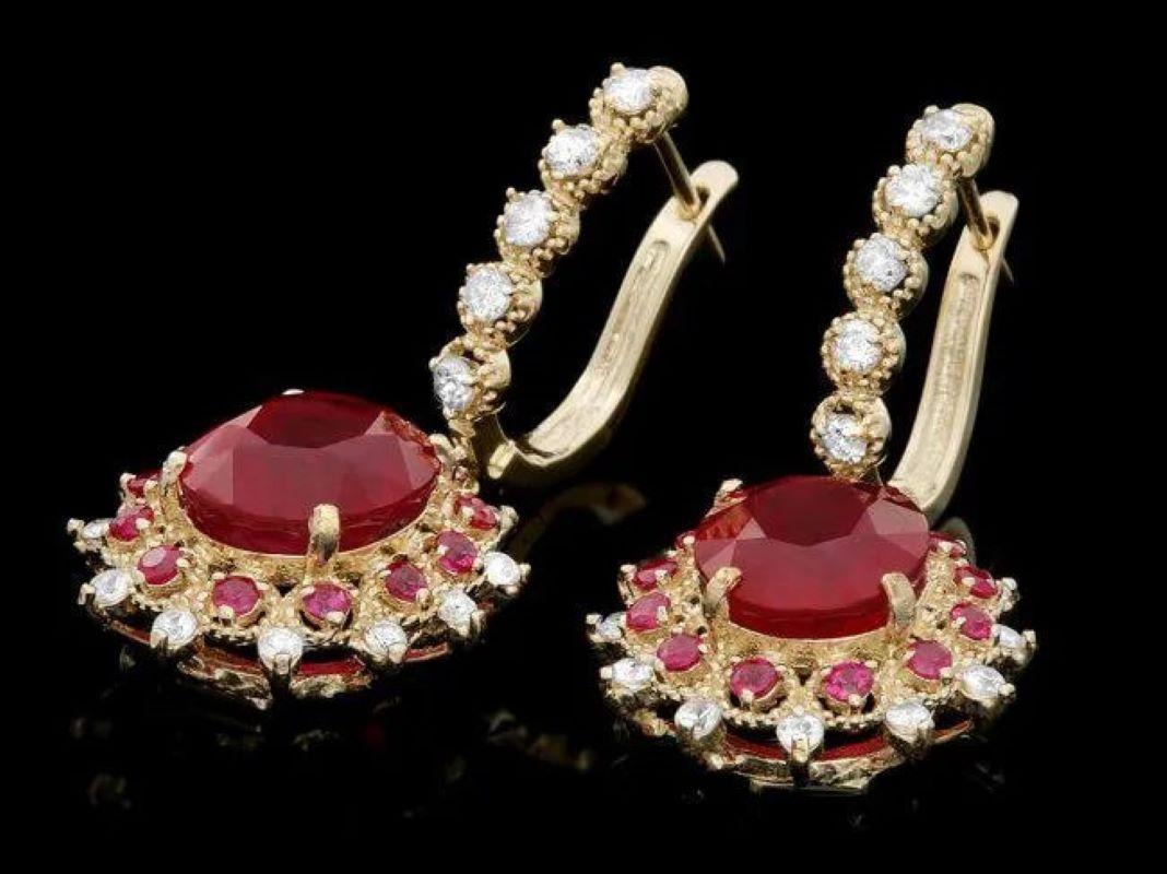 8.30Ct Natural Ruby and Diamond 14K Solid Yellow Gold Earrings

Total Natural Rubies Weight: Approx.  7.40 Carats

Ruby  Measures: Approx. 11 x 8 mm (2 oval)

Ruby  Measures: Approx. 1.8 x 2 mm (24 round)

Ruby Treatment: Fracture Filling

Total