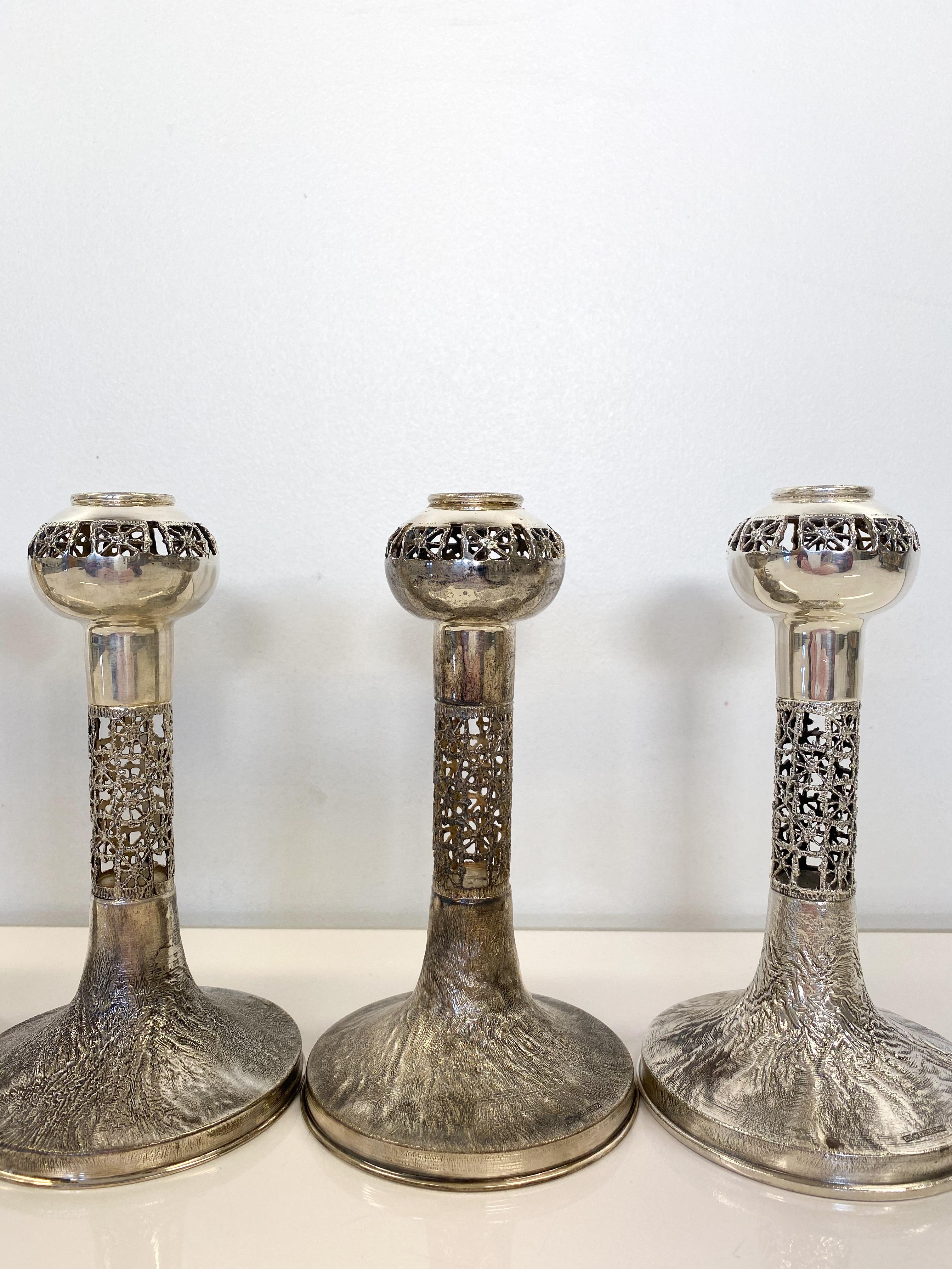 830H Sterling Silver 1972-1975 Finland Pentti Sarpaneva Six Lace Candleholders
Six candleholders made 1972, 2ps 1973, 1974, 1975 and 1976
Height 16cm, Diameter 9cm
Silver 830H
Minor wear, engravings in 3 of them at the bottom. See picture.

Pentti