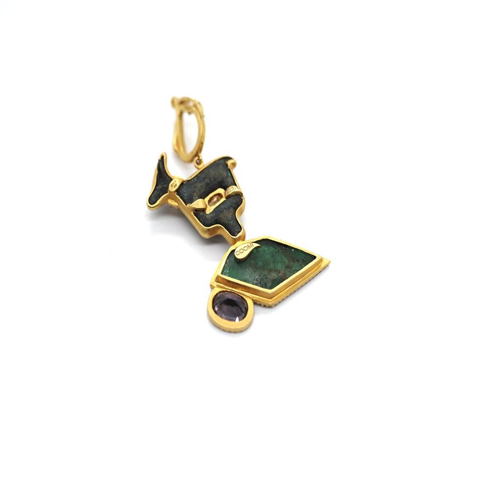 Antiquity Bronze Ibex Pendant Set in 20 Karat Yellow Gold With 0.85cts Diamonds, 8.31cts Emerald, and 2.90cts Sapphire. The Pendant Has A Beautiful Large Emerald Slice And Is Approximately 1.35 Inches. The Ibex Figure Design is Dated To Be 1500-1600