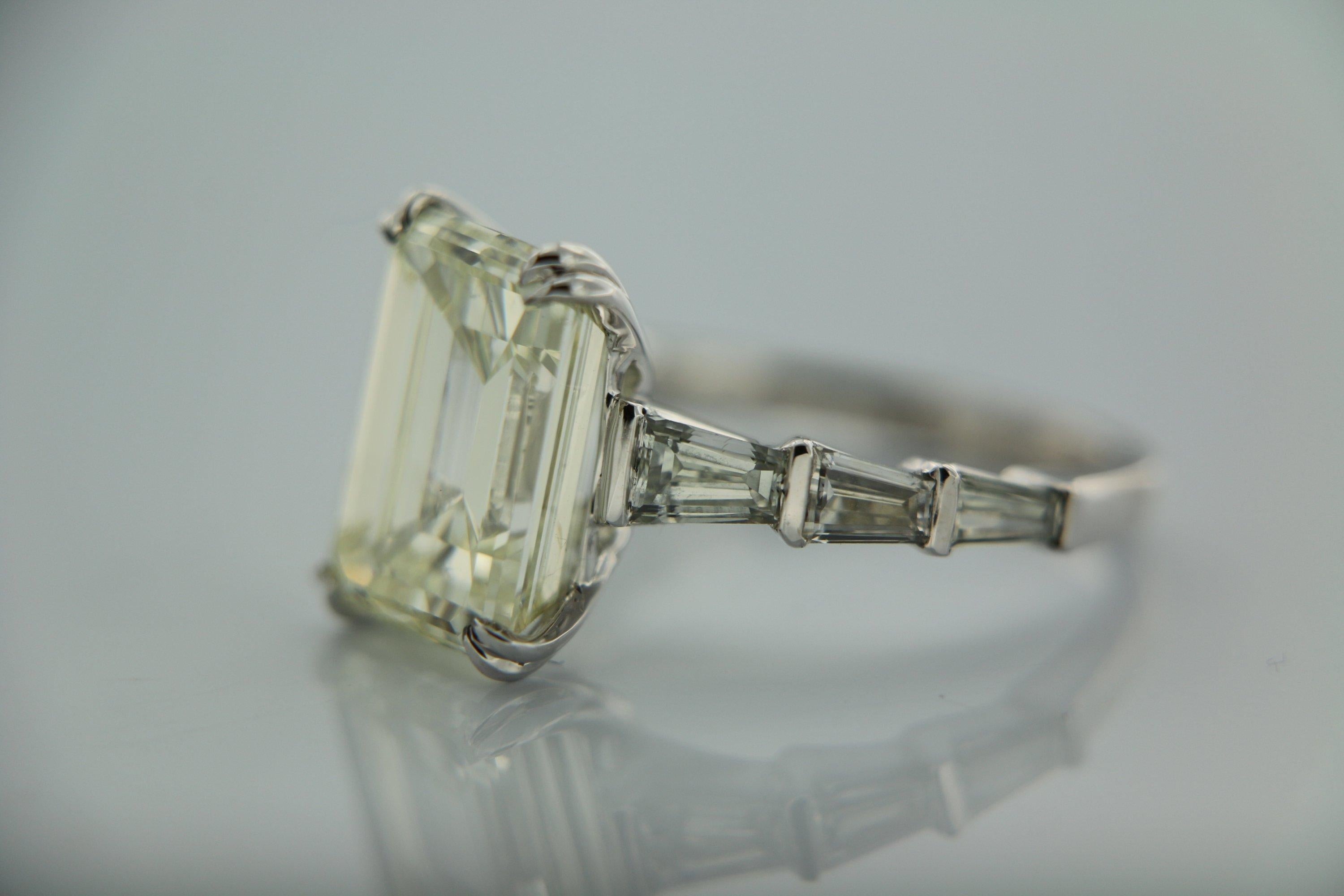 Emerald Cut 8.31 Carat Emerald cut White Diamond And Baguette Ring In 18K Gold.  For Sale