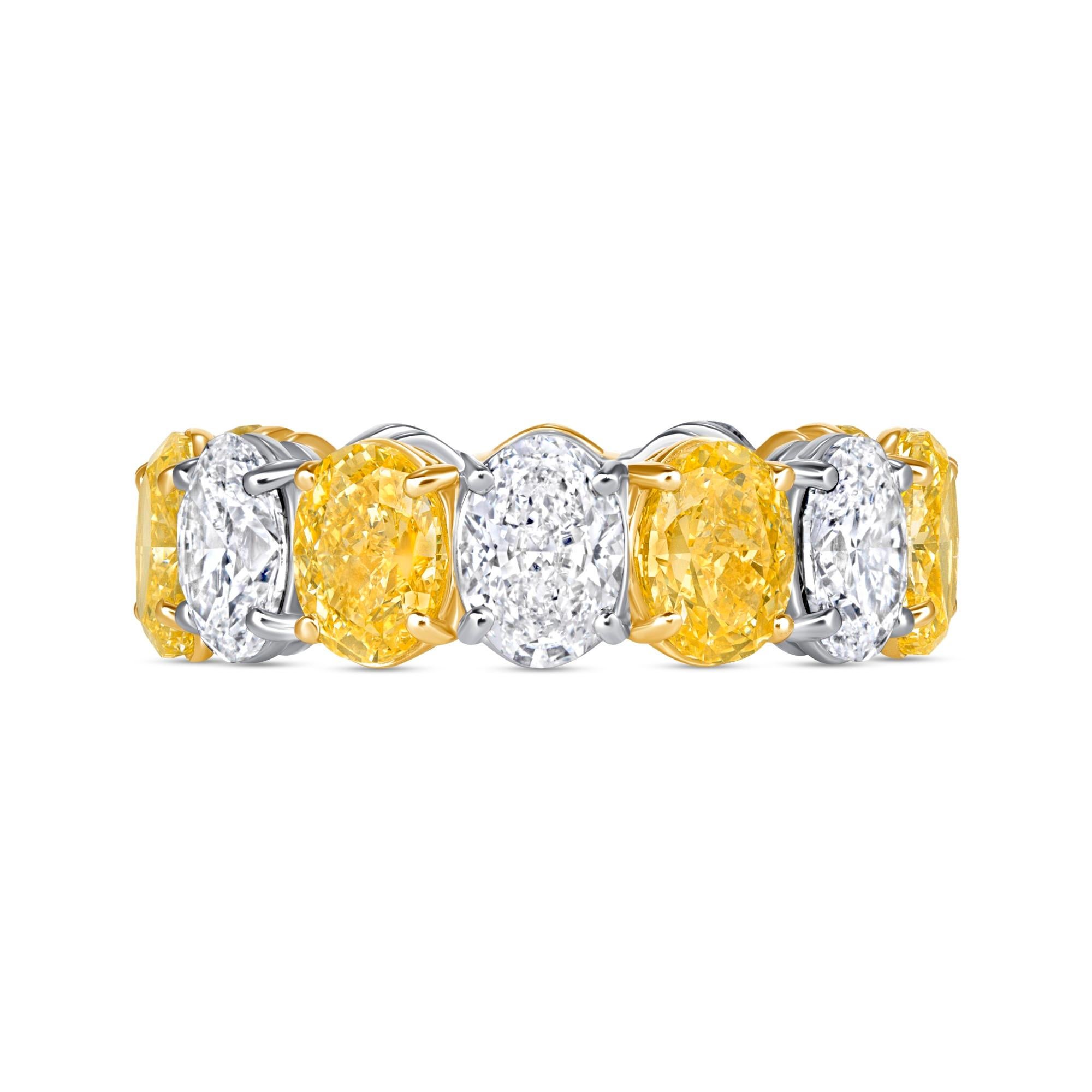 Alternating Oval Fancy Intense Yellow Diamond and Oval Diamond ring set in 18K Yellow Gold and Platinum. This ring has seven Oval Fancy Intense Yellow diamonds weighed 4.75ctw, and seven oval diamonds weighed 3.56ctw with GIA certified in E to F