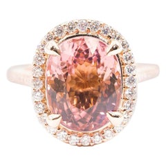 8.32 Carat Oval Pink Tourmaline 0.80 Carat Diamond 18 Carat Gold Cluster Ring