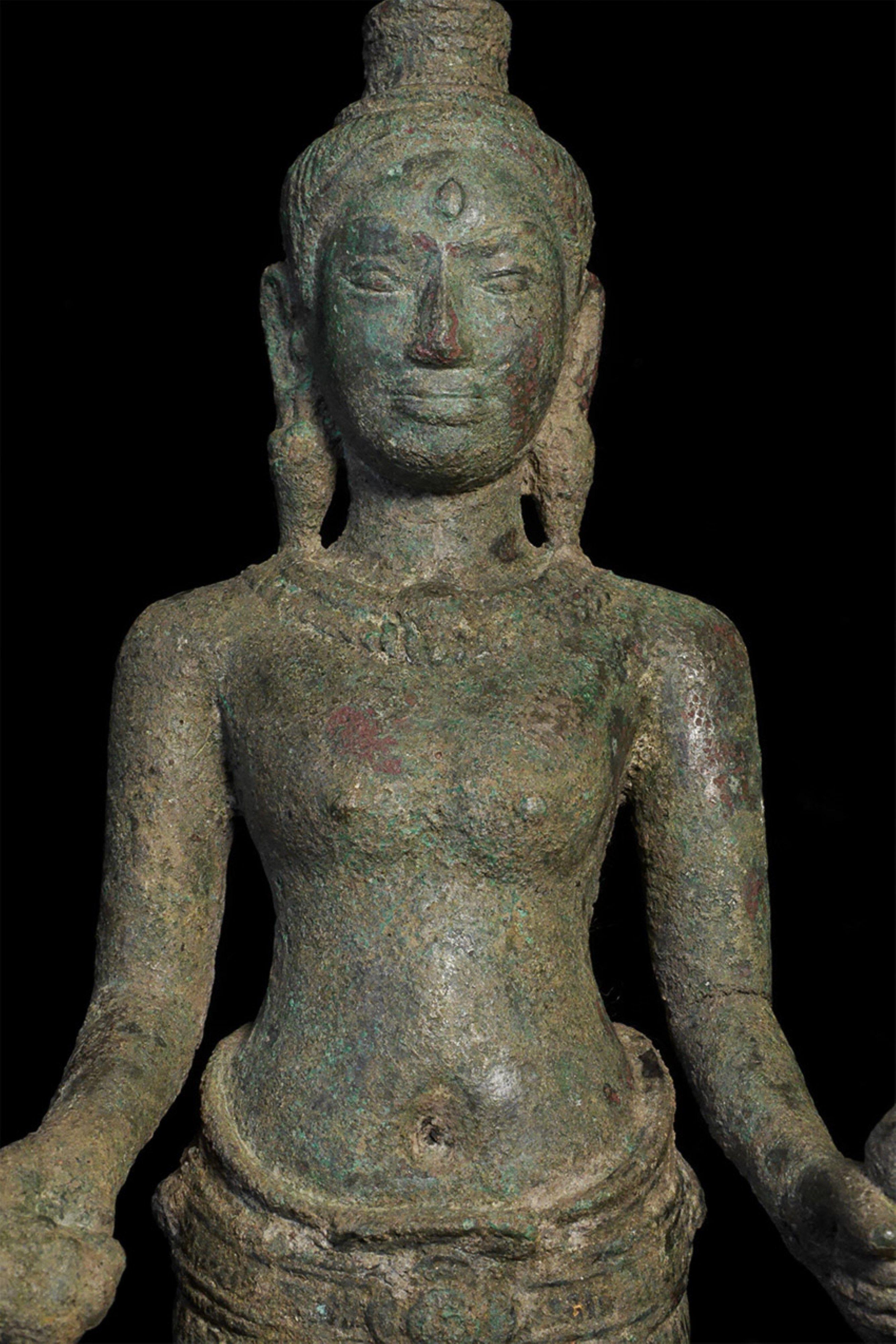 Very fine 11-13thC Cambodian Uma statue. Beautiful face, and strong spiritual presence. Left arm shows where it was originally attached during manufacture. It is only noticeable upon close inspection. Quite large for its type at 10.25
