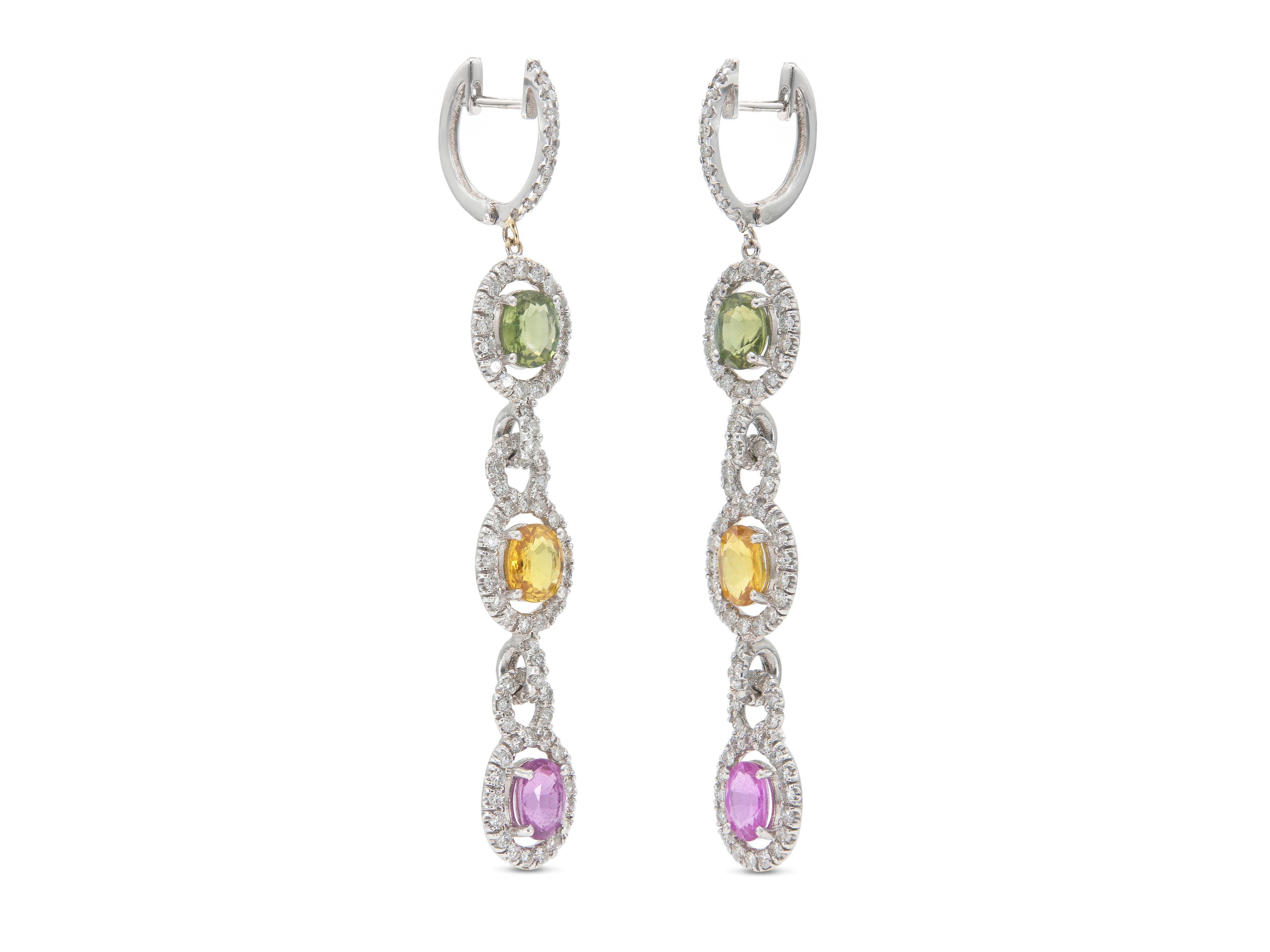 Finely crafted in 18k white gold with six Oval cut multi-color Sapphires weighing a total of 8.33 carats and Round Brilliant cut Diamonds weighing a total of 2.91 carats.
3 inches long