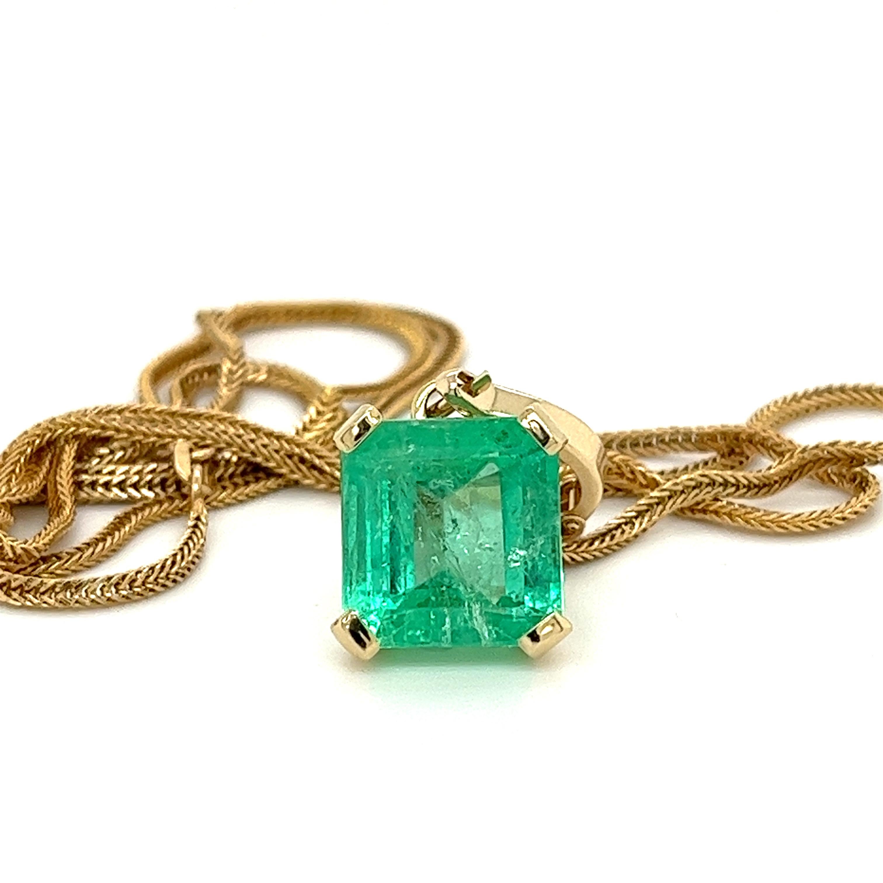 Emerald Cut 8.34 Carat Colombian Emerald Solitaire Pendant Necklace in 14K Gold For Sale