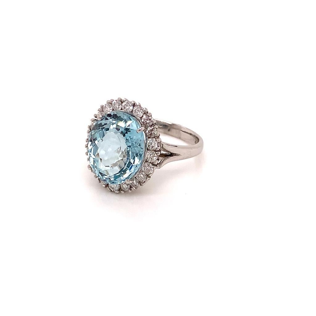 This Spectacular ring is made of an Oval Brilliant 8.34 Carat Aquamarine surrounded by Sparkling Round Brilliant Diamonds weighing 0.69 Carats set in 18K White Gold. Expertly handcrafted, the beauty of this ring radiates with a rhapsodic glow that