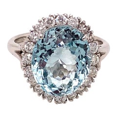 8.34 Carat Oval Cut Aquamarine and Diamond Cluster Ring in 18K White Gold