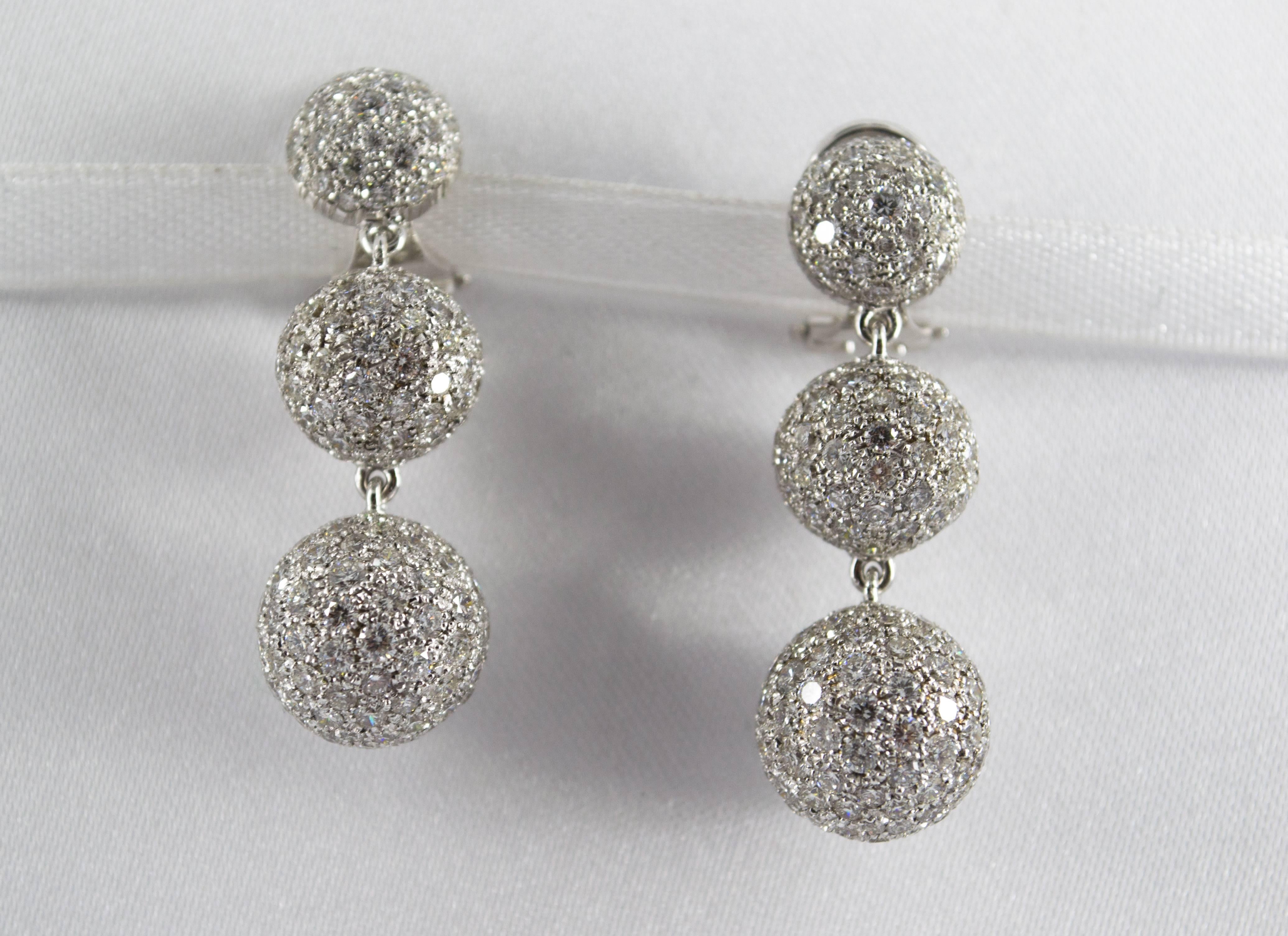 These Earrings are made of 18K White Gold.
These Earrings have 8.35 Carats of White Diamonds.
All our Earrings have pins for pierced ears but we can change the closure and make any of our Earrings suitable even for non-pierced ears.
We're a workshop