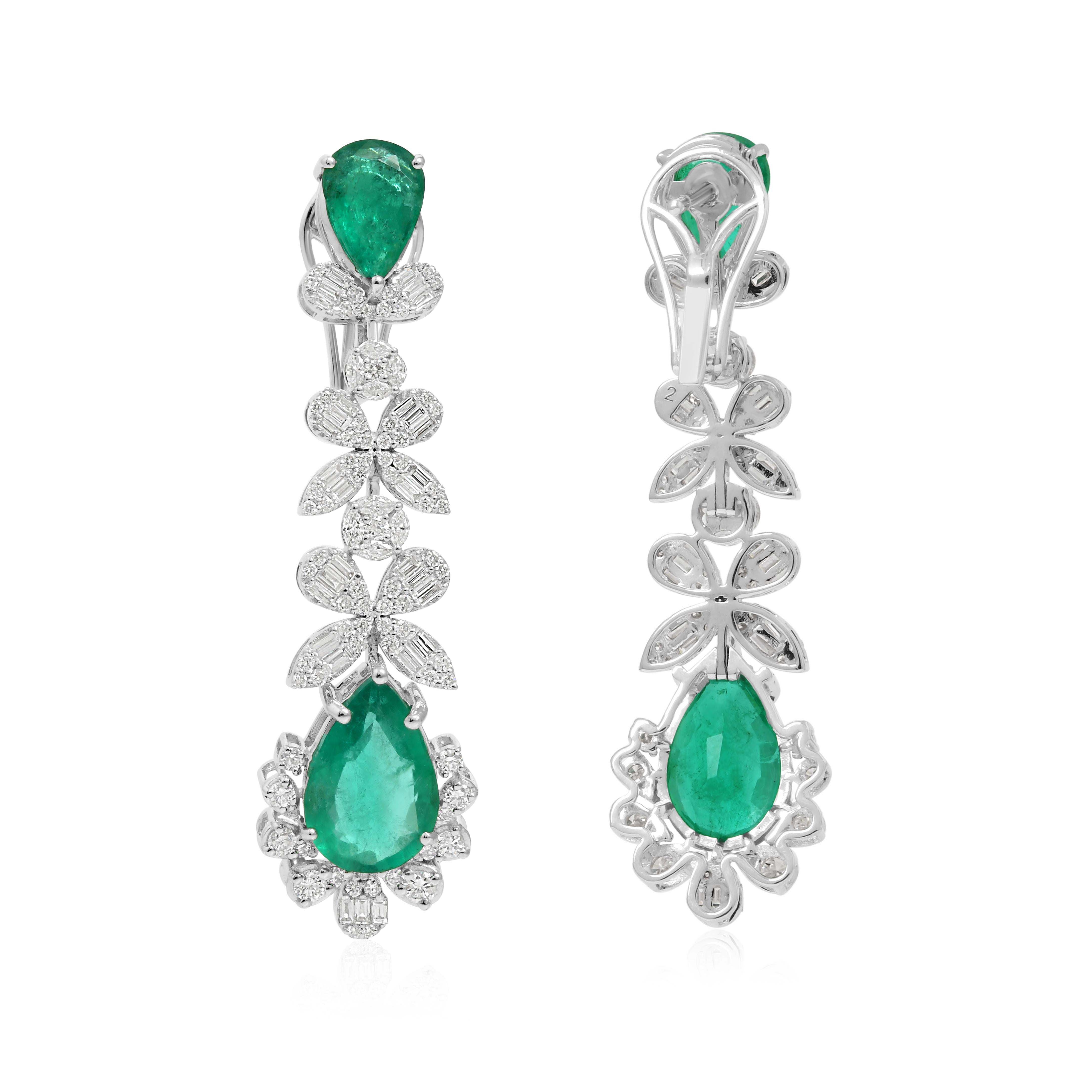 Cast from 18-karat gold, these exquisite earrings are handset with 8.35 carats Zambian emerald and 2.10 carats of sparkling diamonds.

FOLLOW SPECTRUM JEWELS storefront to view the latest collection & exclusive pieces. Spectrum Jewels is proudly