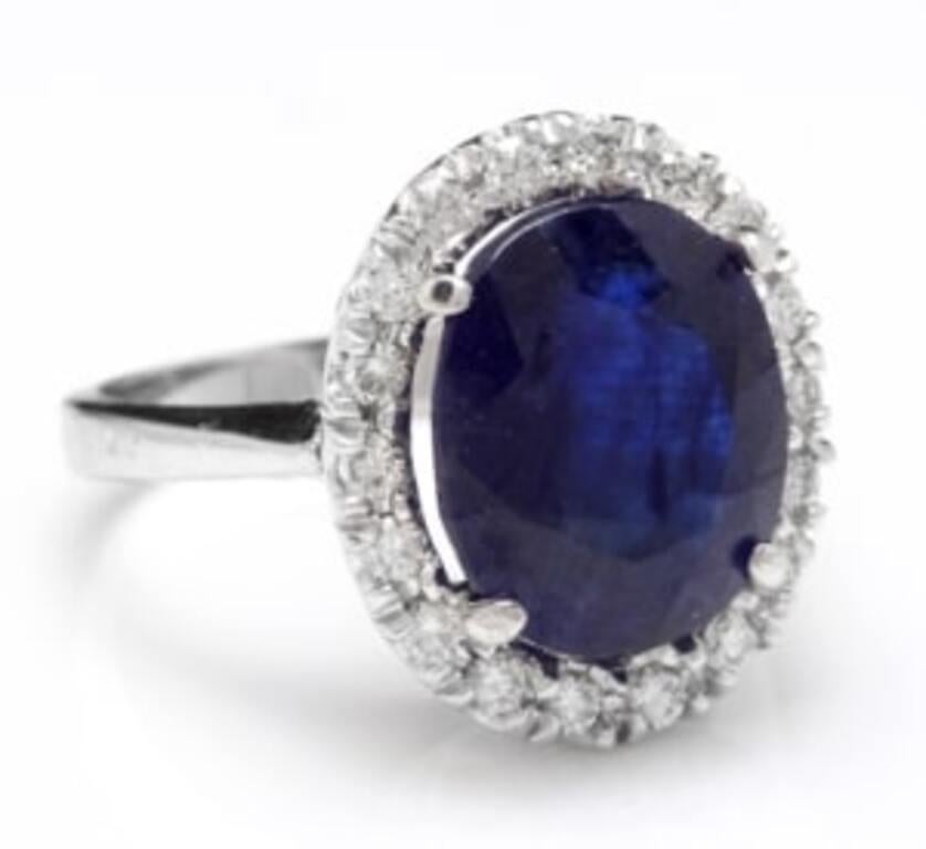 8.35 Carats Natural Sapphire and Diamond 14K Solid White Gold Ring

Total Natural Oval Cut Sapphire Weights: Approx. 7.50 Carats

Sapphire Measures: Approx. 13.00 x 10.00mm

Sapphire Treatment: Filling

Natural Round Diamonds Weight: .85 Carats