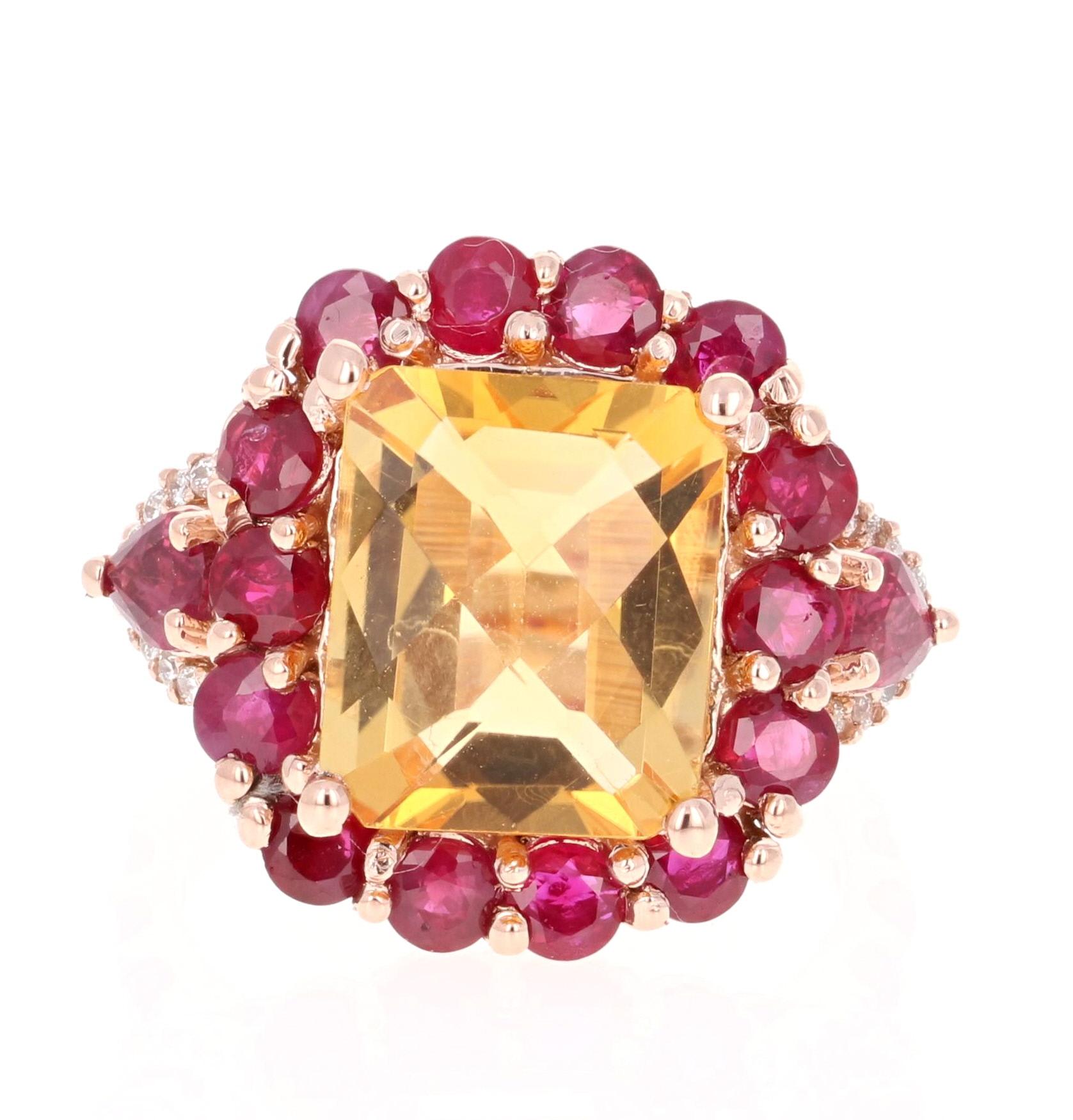 A Stunning and Unique piece to say the least! 

This magnificent ring has a bold Emerald Cut Citrine that is blazing yellow! It weighs 4.88 Carats and is surrounded by a beautiful row of 20 Round Cut Burmese Rubies that weigh 2.73 Carats.   Along