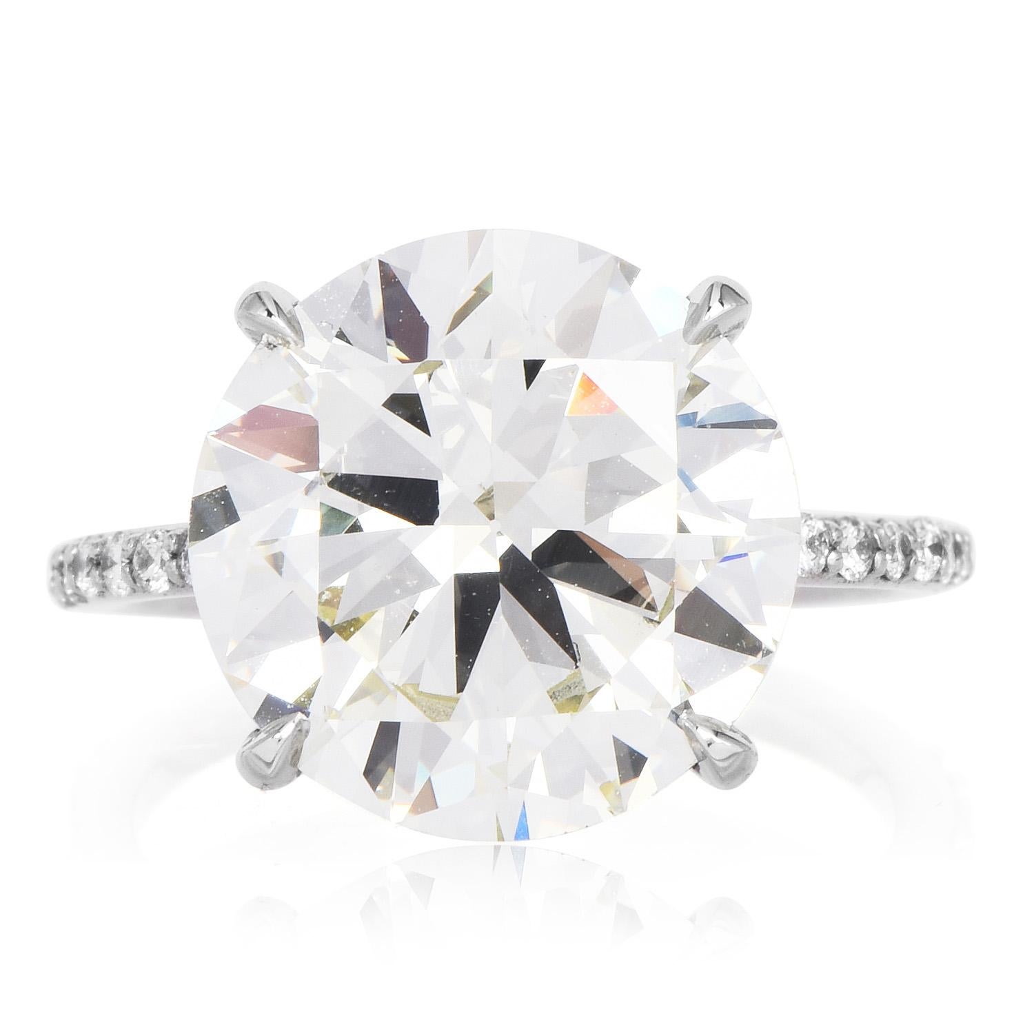 Go Big or Go Home!

A romantic engagement ring, with an incredibly unbelievable round-cut ring.

Crafted in solid platinum, the center is adorned by a Round cut diamond, weighing 8.37 carats. N-O color, VS1 Clarity.  

Complimenting the sides, there