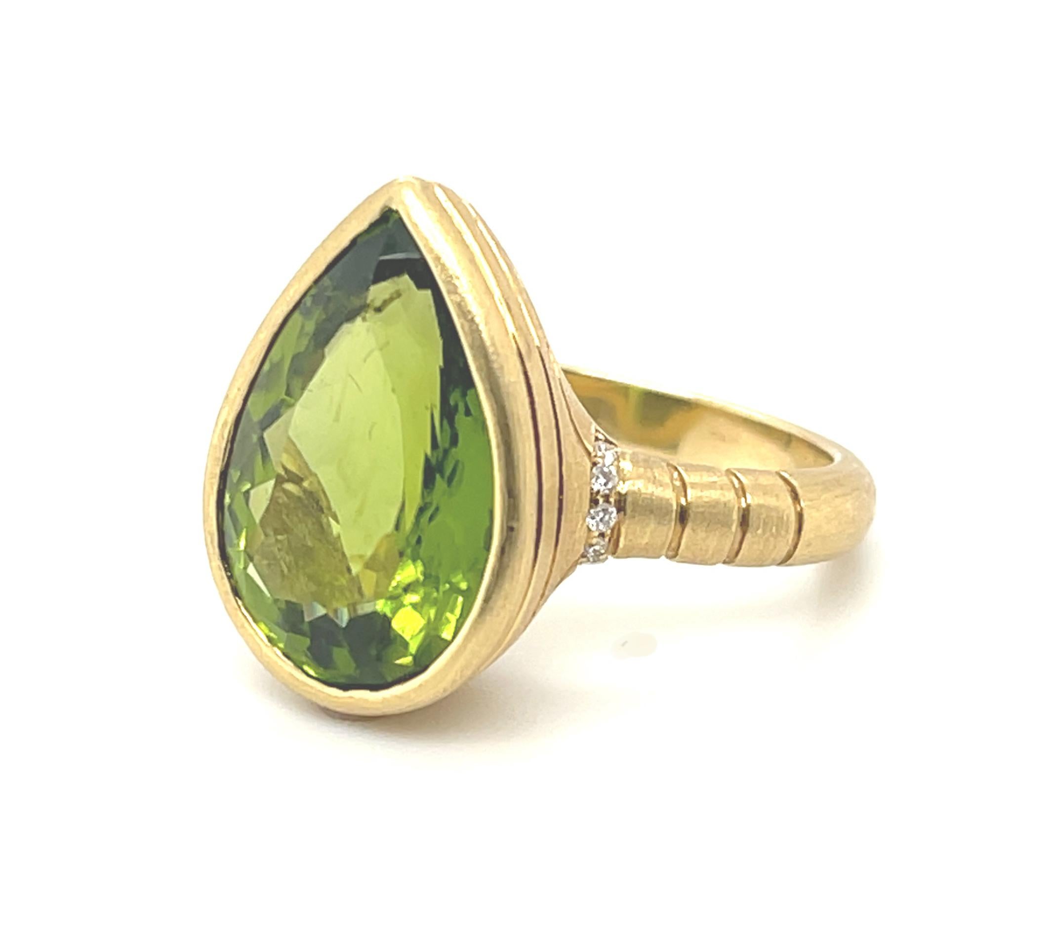 Pear Cut 8.37 ct. Pear Shape Peridot and Diamond Ring in 18k Yellow Gold For Sale