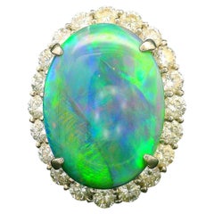 8.38 Carat Australian Black Opal Diamond Platinum Halo Ring