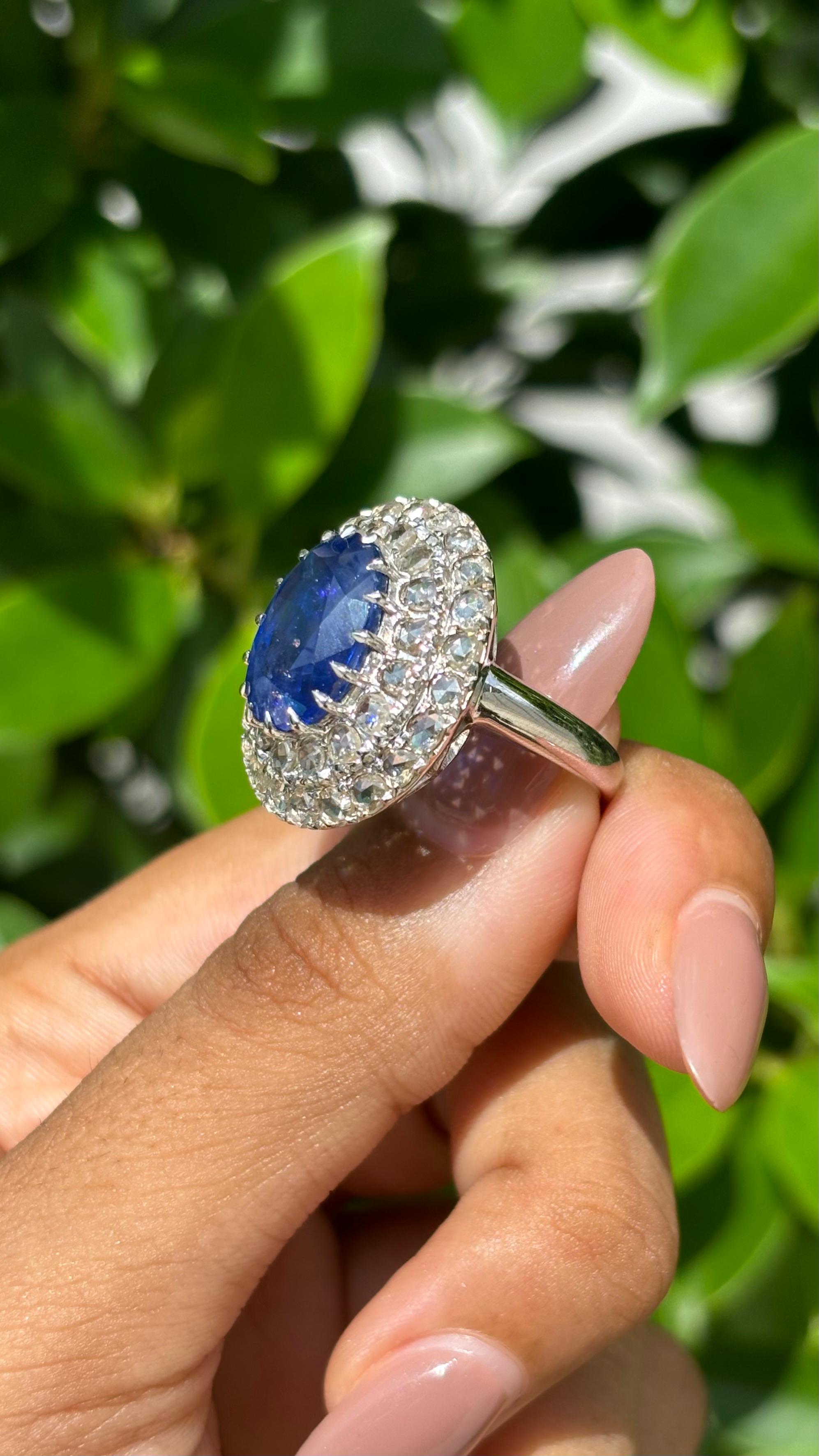 Oval Cut 8.38 Carat Ceylon Sapphire & Rose-cut Diamond studded Ring in 14K White Gold