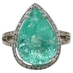 Anillo con turmalina Paraíba de 8,38 ct, de color verde neón intenso y con trazas de cobre, en oro blanco de 18 quilates, con certificado