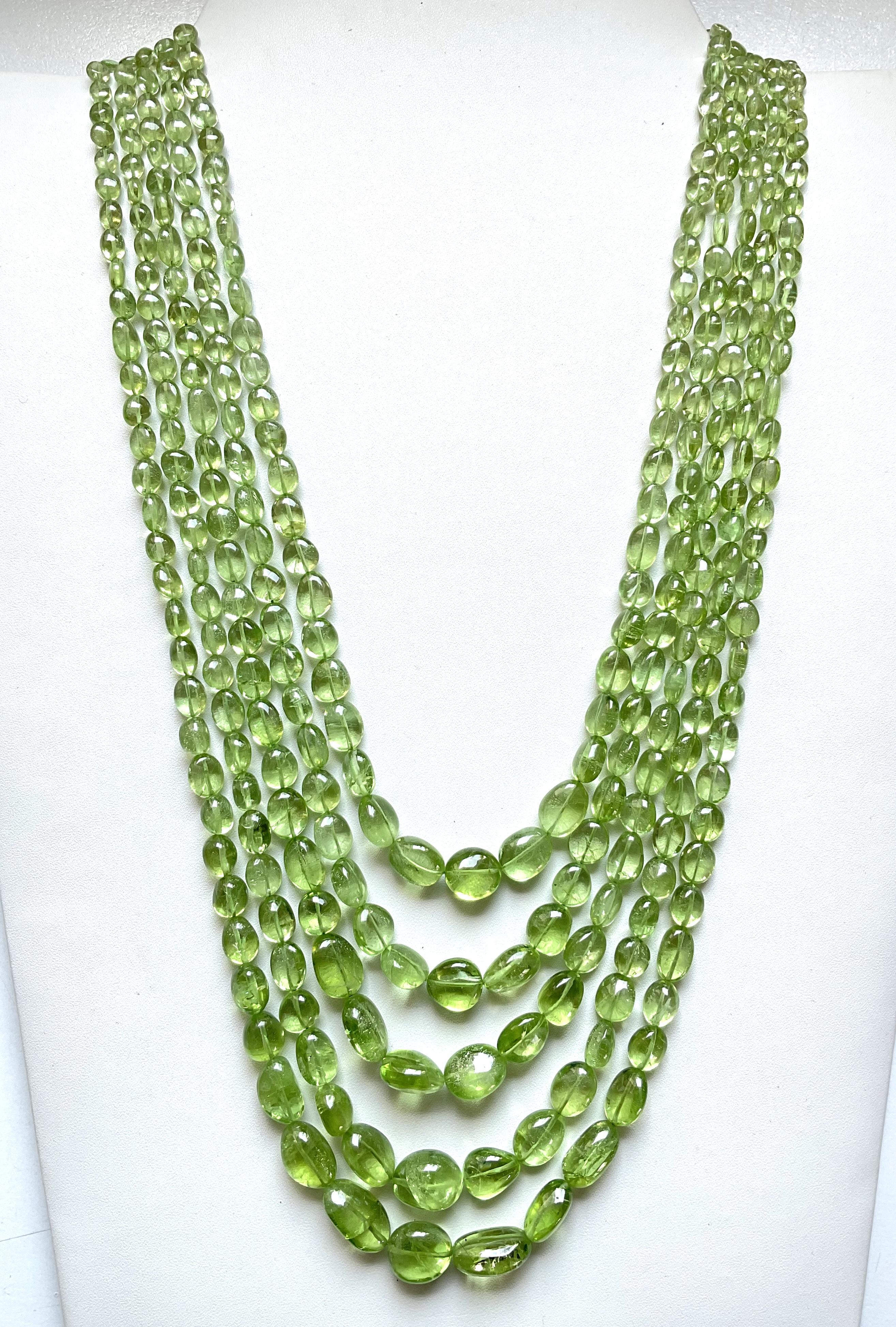 839.05 carats apple green peridot top quality plain tumbled natural necklace gem

Gemstone - Peridot
Size : 4x3 To 12x14 mm
Weight : 839.05 Carats
Strand - 5 Line