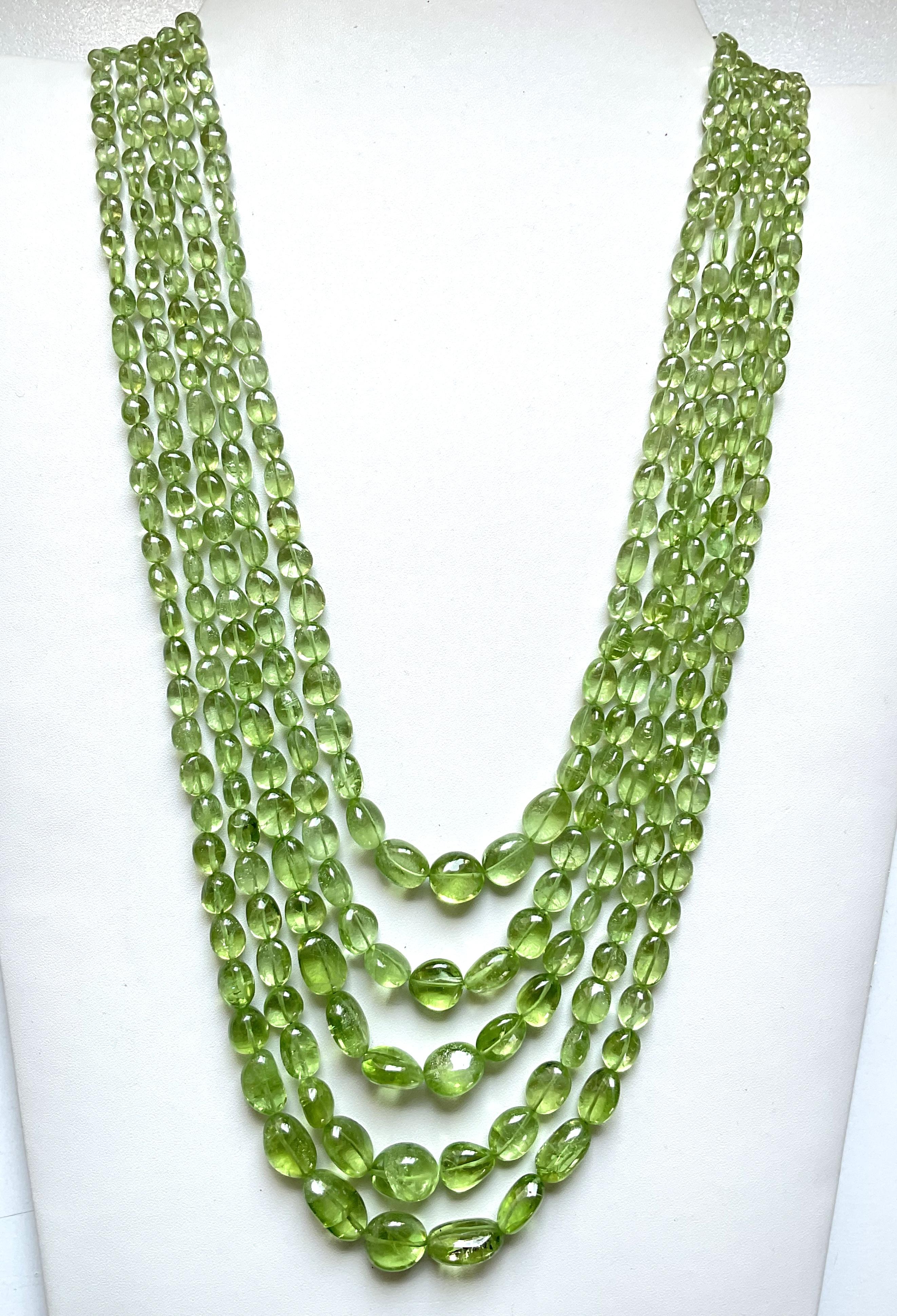 Tumbled 839.05 carats apple green peridot top quality plain tumbled natural necklace gem For Sale