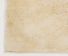 Hand-Knotted Minimalist Solid Beige Wool Tulu Rug. Contemporary High-Pile Design