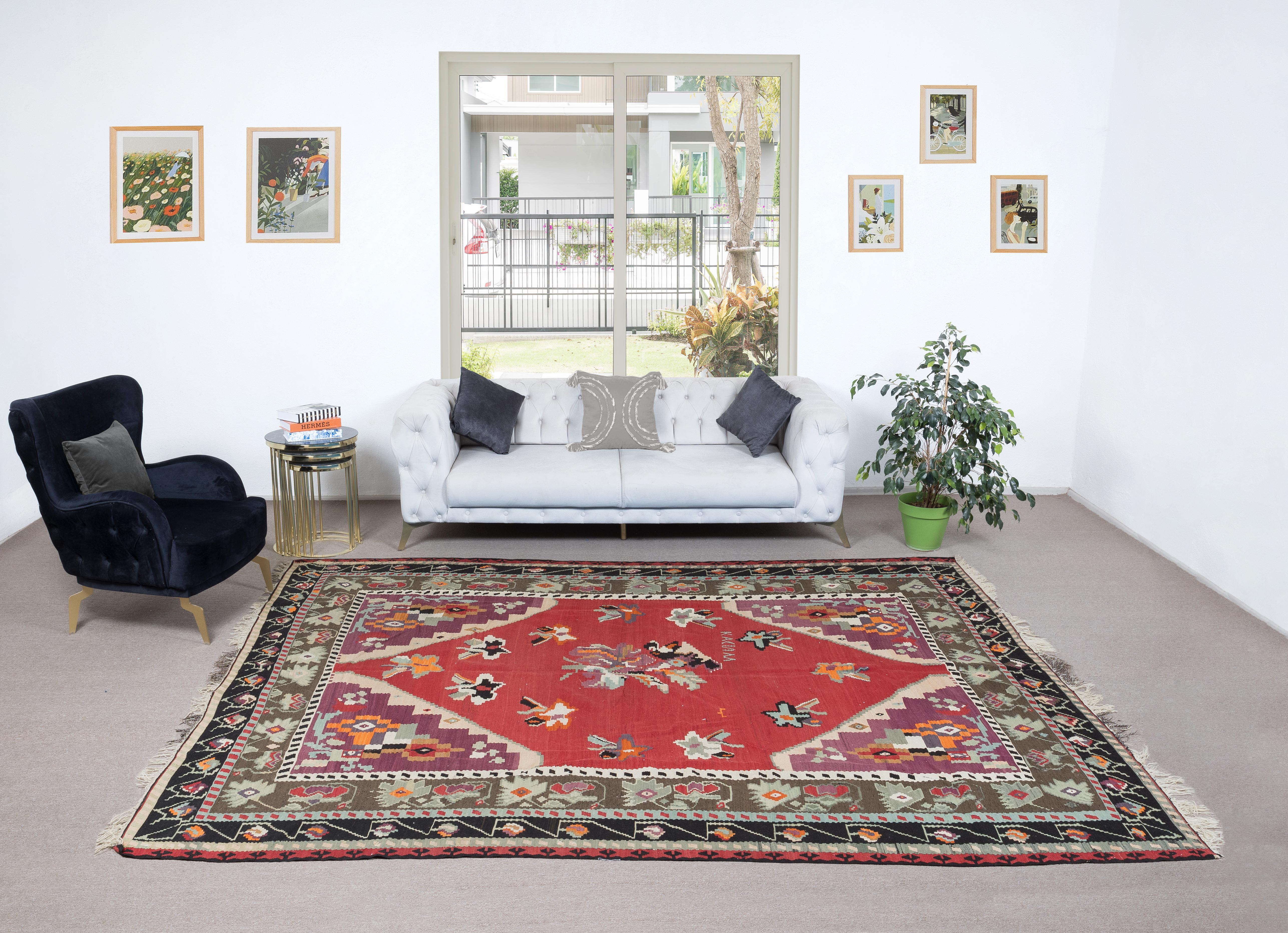 Enrich your living space with the rustic charm and timeless elegance of this vintage Bosnian flat-weave wool kilim. Crafted with skill and care by Bosnian artisans, this kilim is a testament to the rich cultural heritage and traditional