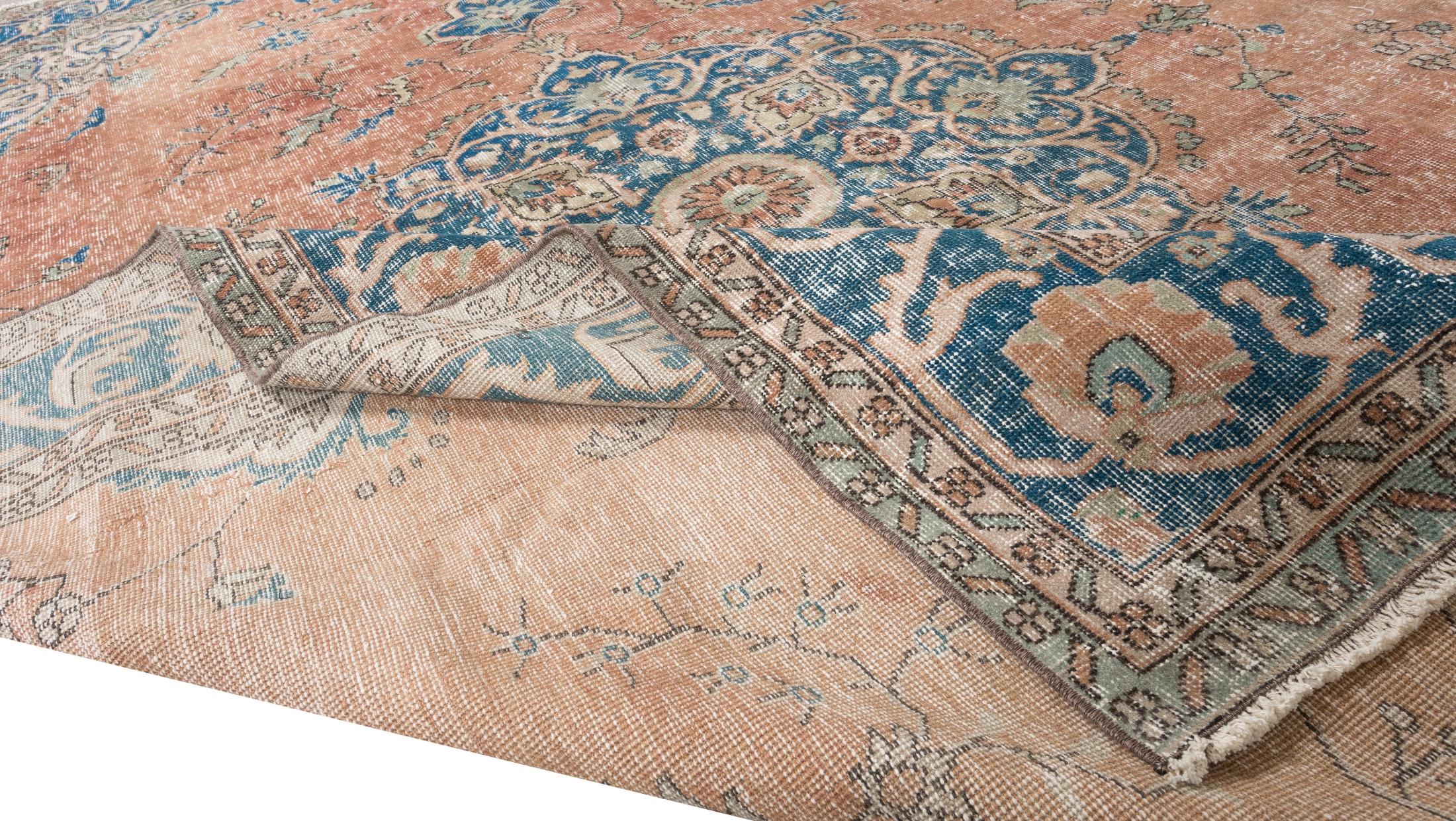A finely hand-knotted vintage Central Anatolian rug from 1960s. The rug has even low wool pile on cotton foundation. It is heavy and lays flat on the floor, in very good condition with no issues. It has been washed professionally, The rug is sturdy
