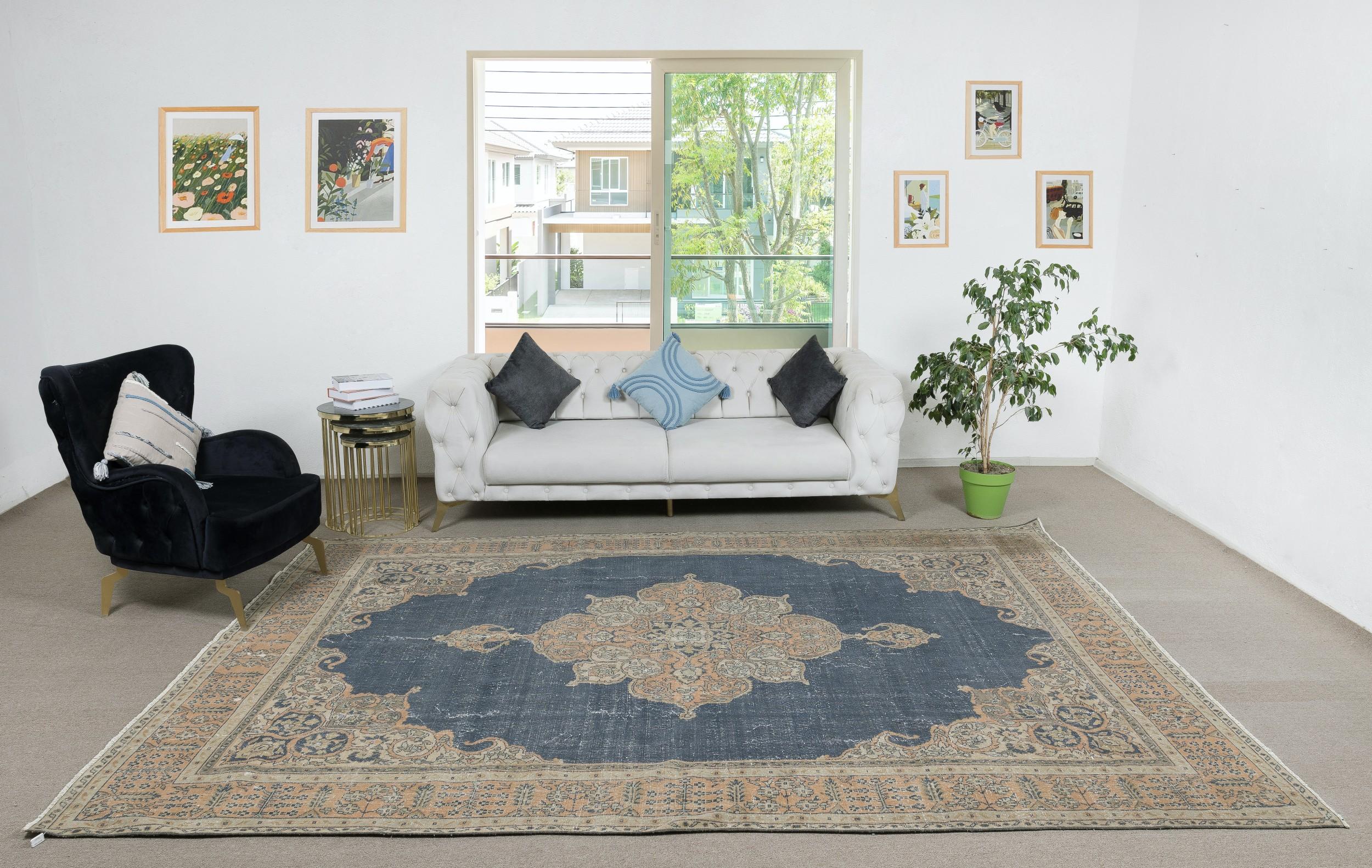 Infuse your home with the timeless beauty of this traditional vintage handmade Turkish rug, a hand-knotted masterpiece crafted from a luxurious blend of wool and cotton. Woven by skilled artisans using centuries-old techniques, this rug features