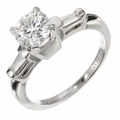 Bague de fiançailles Solitair en platine avec diamants ronds baguettes de 0,84 carat