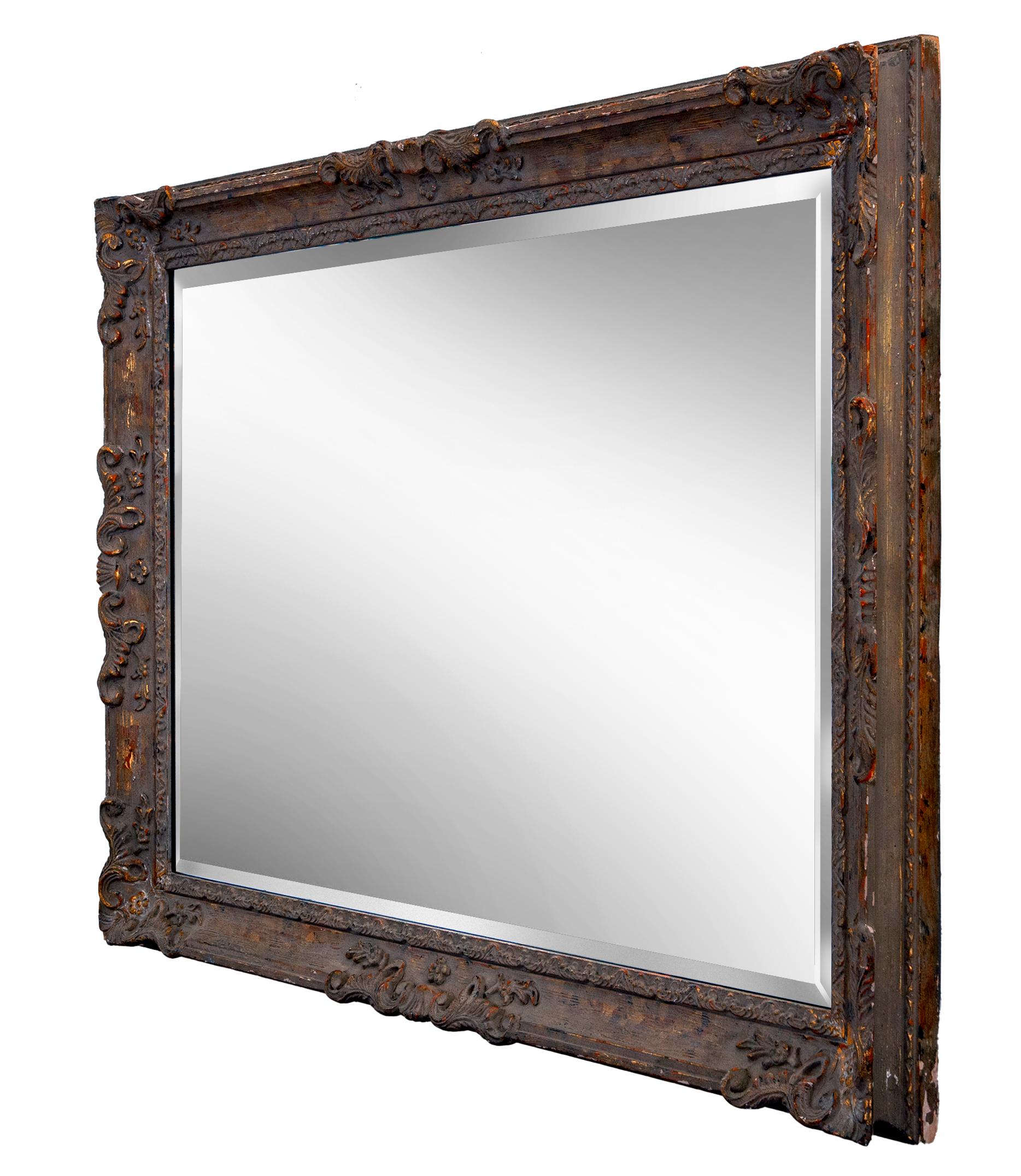 French Provincial style large beveled mirror with gold peeking from beneath the dusty neutral finish.
New backing secures the heavy mirror, wired to hang horizontally & vertically.
