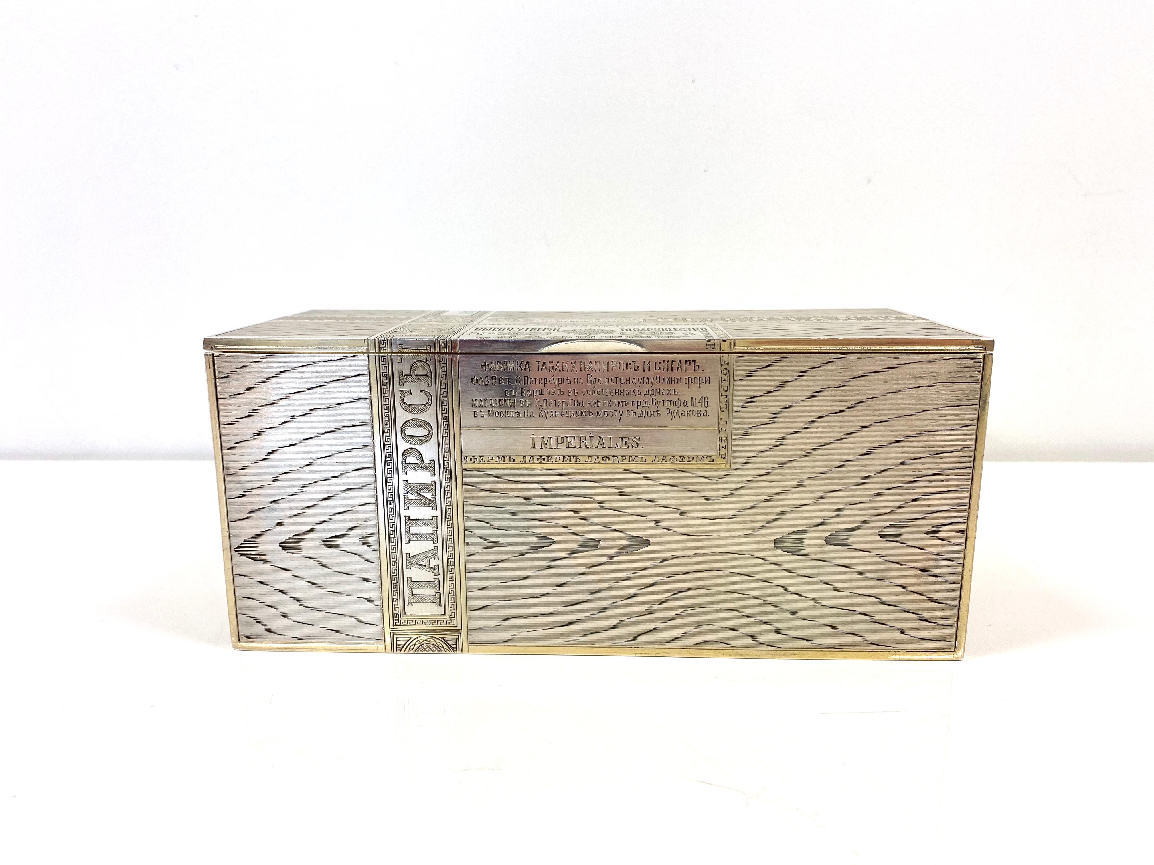 84 Silver Russia 1880 Antique trompe-l’oeil Cigarette Box
Made in Russia in 1880, the lid and sides superbly engraved to imitate woodgrain and tobacco paper tax bands.
Cigar boxes this size are rare.
Marked with 84 zolotniks Imperial Russian silver