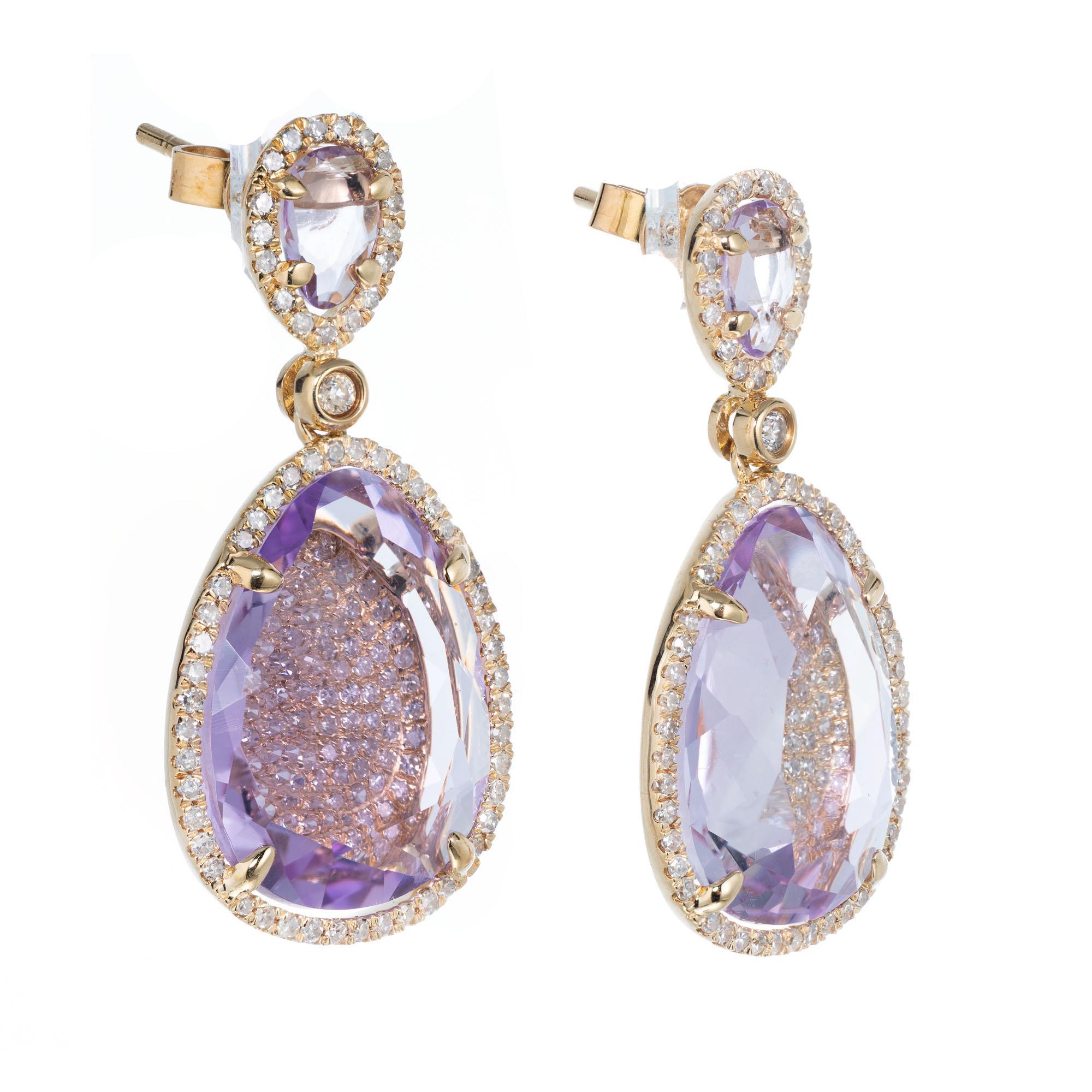 Amethyst and diamond dangle earrings. Handmade in 14k rose gold with 258 micro pave diamonds and genuine soft light purple amethyst.

2 pear shaped purple Amethyst, approx. total weight 8.00cts, 6.28 x 4.10 x 1.62mm 
2 pear shaped purple Amethyst,