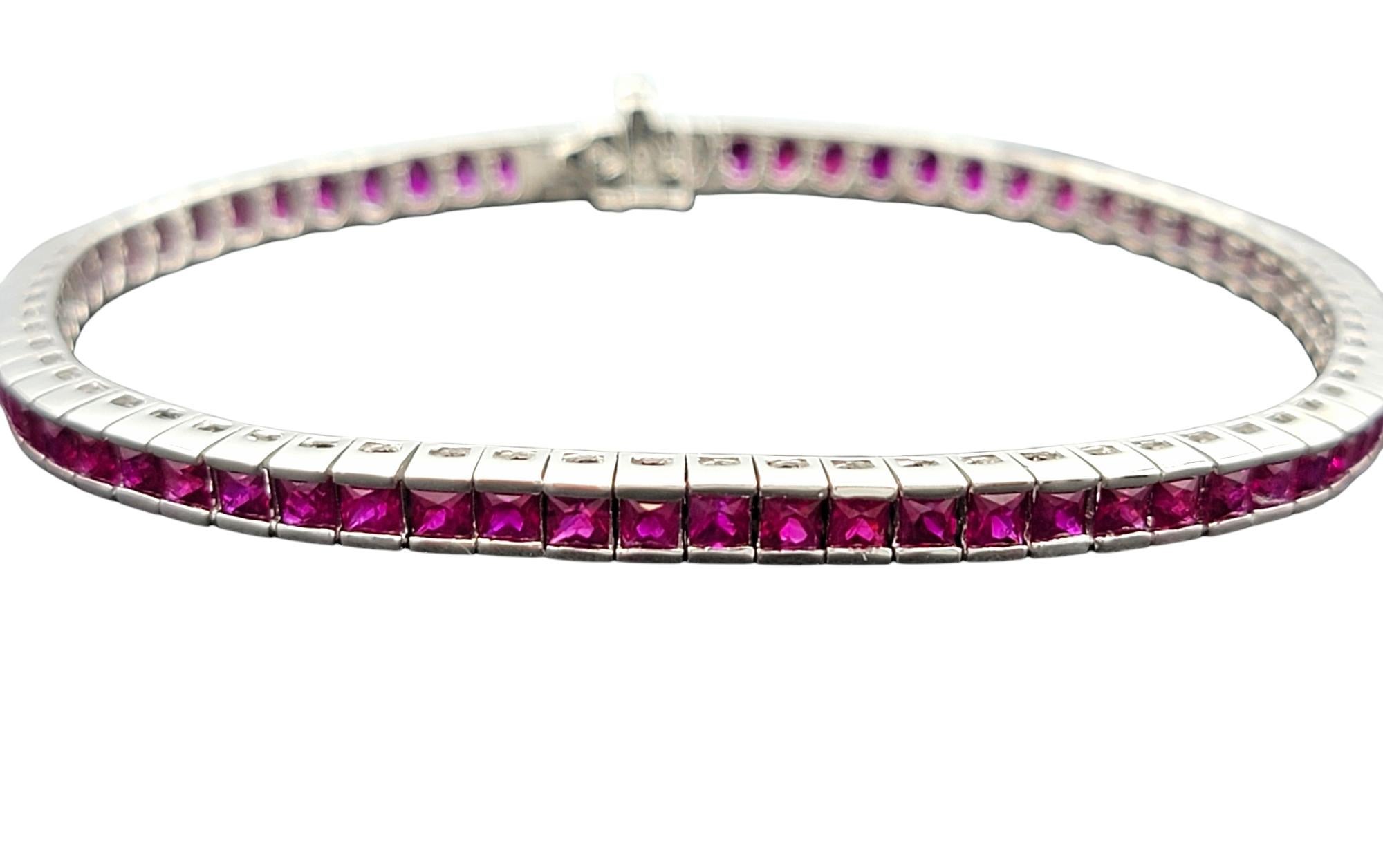 Contemporary 8.40 Carat Channel Set Square Cut Ruby Tennis Bracelet in 14 Karat White Gold For Sale