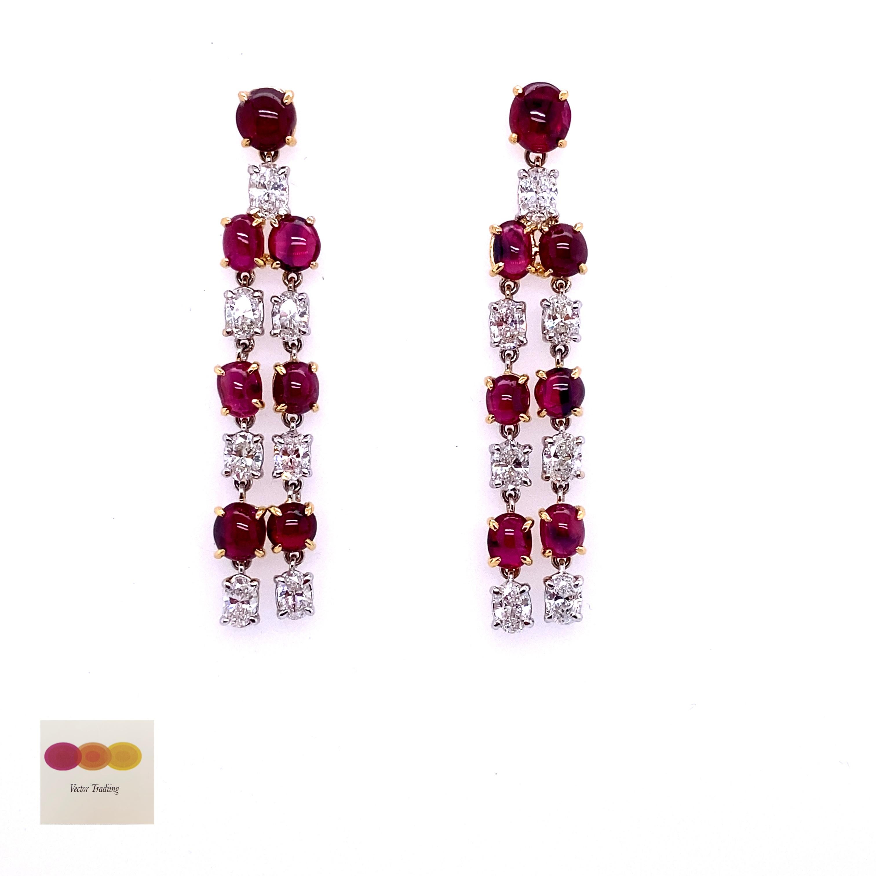 8.40 Carat GIA Certified Burma No Heat Pigeon's Blood Red Ruby Diamond Earrings:

A rare jewel, it features fourteen unheated vivid red Burmese ruby cabochons weighing 8.40 carat interspersed with white oval-cut diamonds weighing 2.81 carat. The