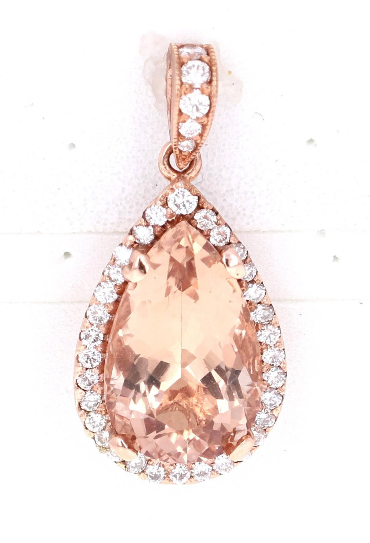 Gorgeous 6.28 Carat Morganite Diamond Rose Gold Pendant to match all your Rose Gold jewelry!

There is a Pear Cut Morganite that weighs 7.70 Carats and is surrounded by 36 Round Cut Diamonds that weigh 0.70 Carats.  The total carat weight of the