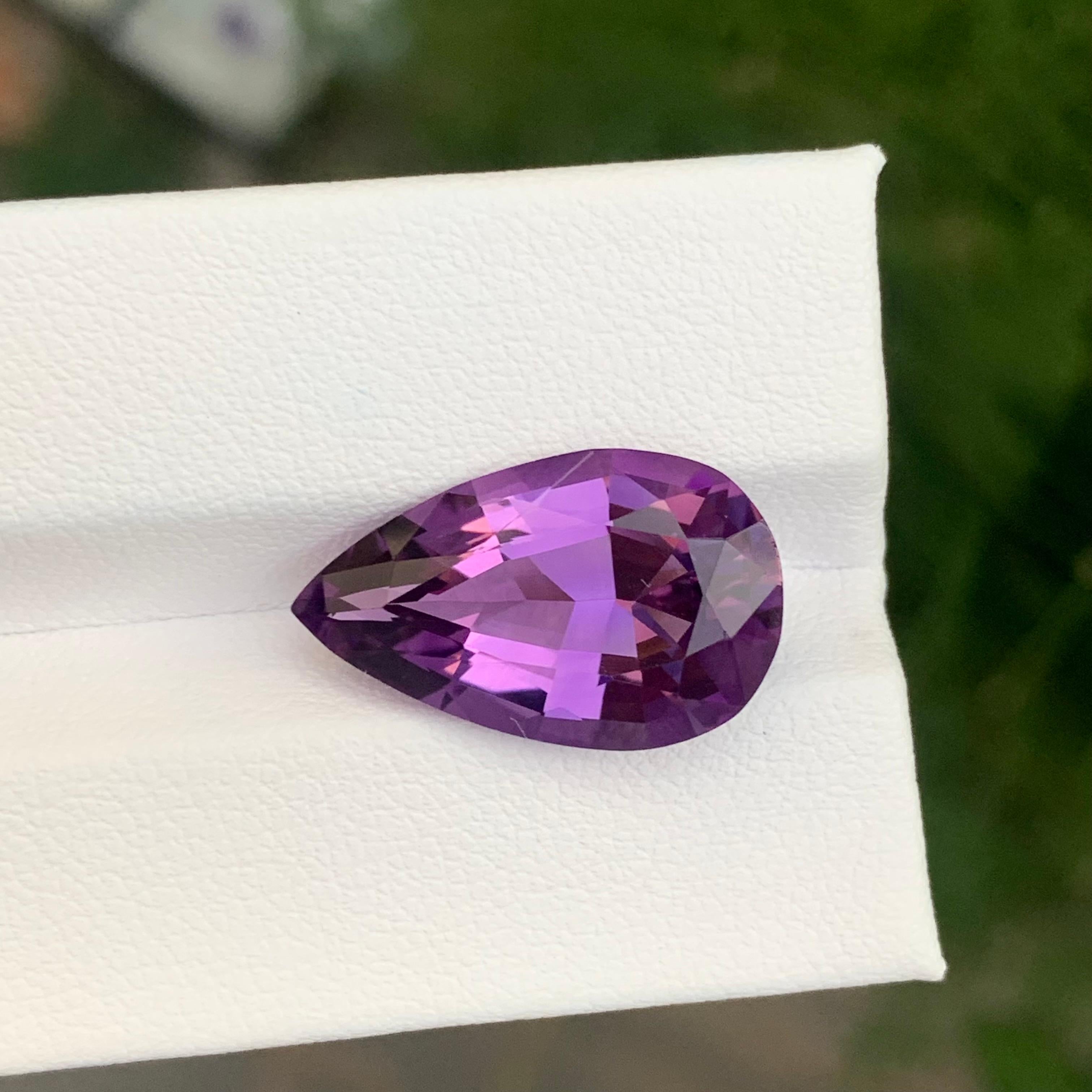 Stone: Amethyst

Weight : 8.40 Carats
Dimension: 19.5 x 11.9 x 7.8 Mm
Origin: Brazil
Shape: Pear
Color: Purple
Treatment: Non
Certificate: On Customer Demand

Amethyst, a stunning violet variety of quartz, is known not only for its beauty but also
