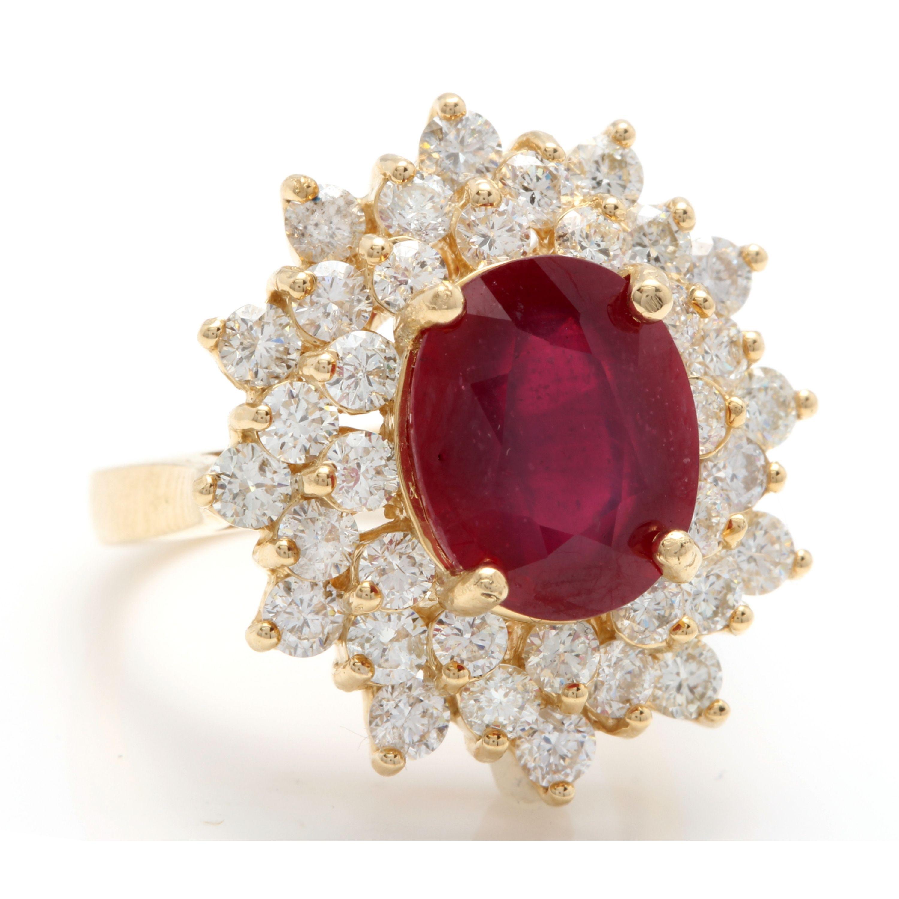 8.40 Carats Impressive Red Ruby and Diamond 14K Yellow Gold Ring

Total Red Ruby Weight is: Approx. 6.50 Carats (Treated: Lead Glass Filling)

Ruby Measures: 11.00 x 9.00mm

Natural Round Diamonds Weight: Approx. 1.90 Carats (color G-H / Clarity