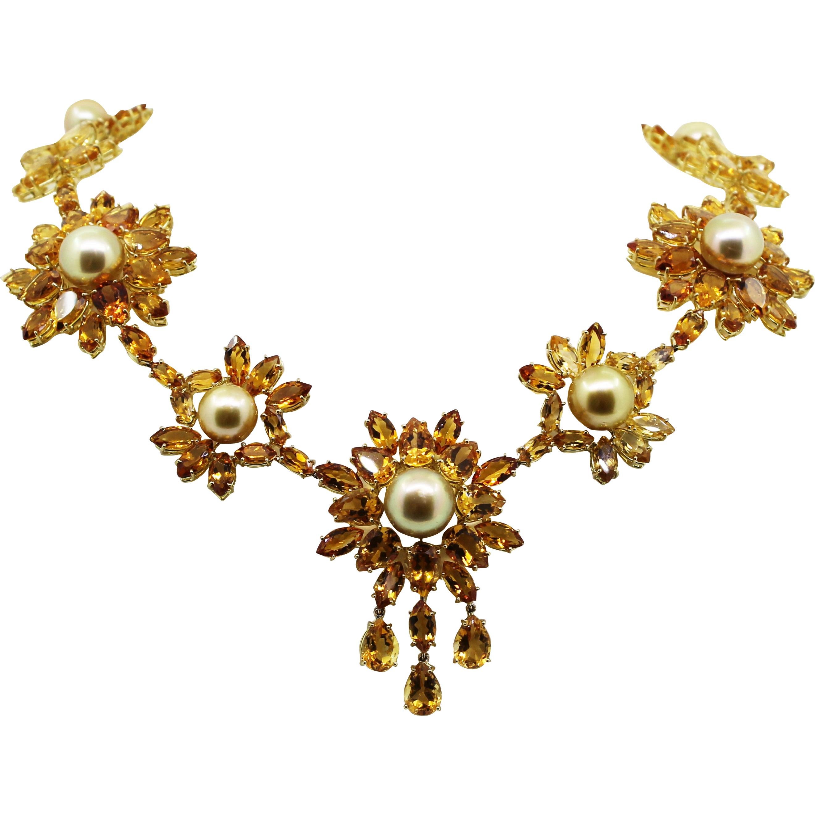 An oversized Golden Pearls and Deep Yellow Citrine Beaded Necklace, ideal for almost every occasion.

The 7 Natural Colour Golden Pearls of 84.00 Carat Total, are in the centre of Deep Yellow Marquise Citrine flowers.
This bright and solar Beaded