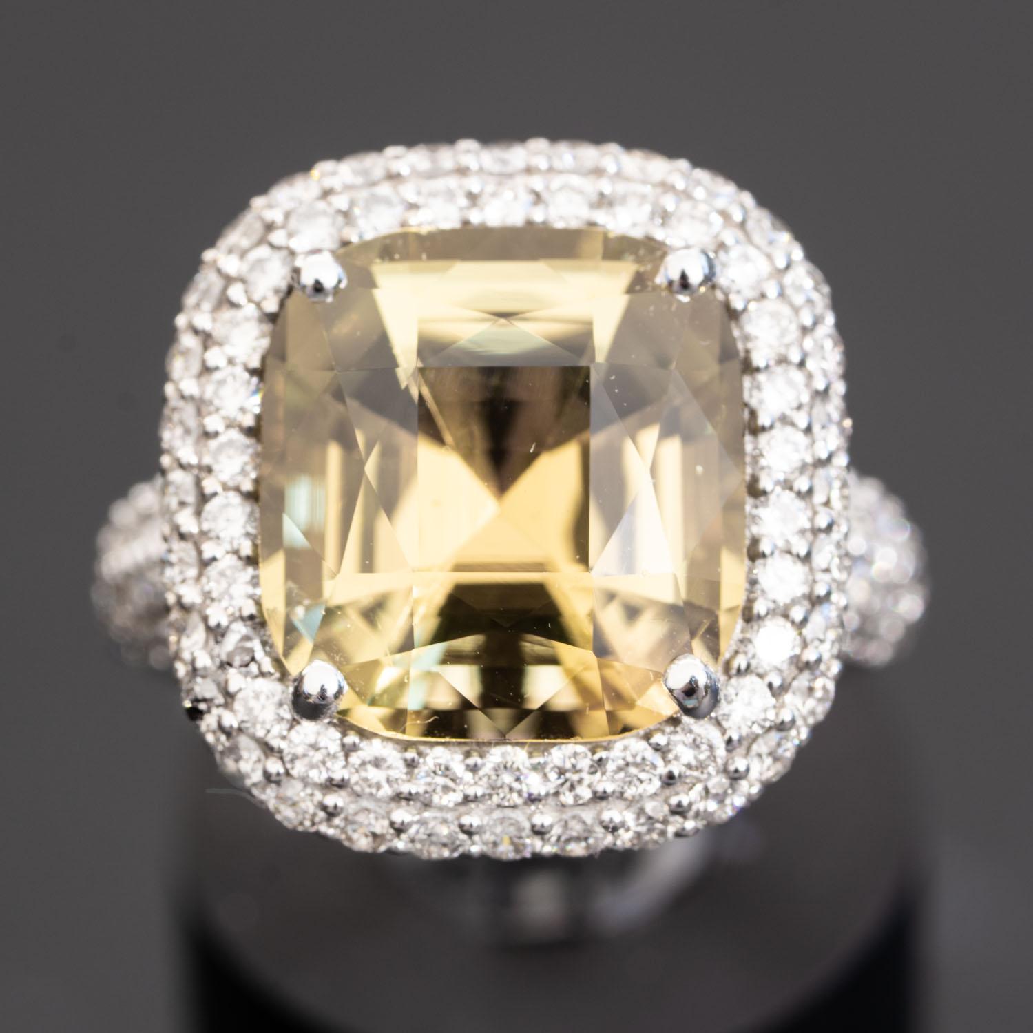 This cushion cut tourmaline diamond ring is simply stunning! The large 8.40 carat (10.5mmX10.5mm) natural central tourmaline surrounded by 1.85 carat sparkling natural diamonds D- F VS.

One of a kind
Main Stone: Natural, Genuine Tourmaline
Carat: