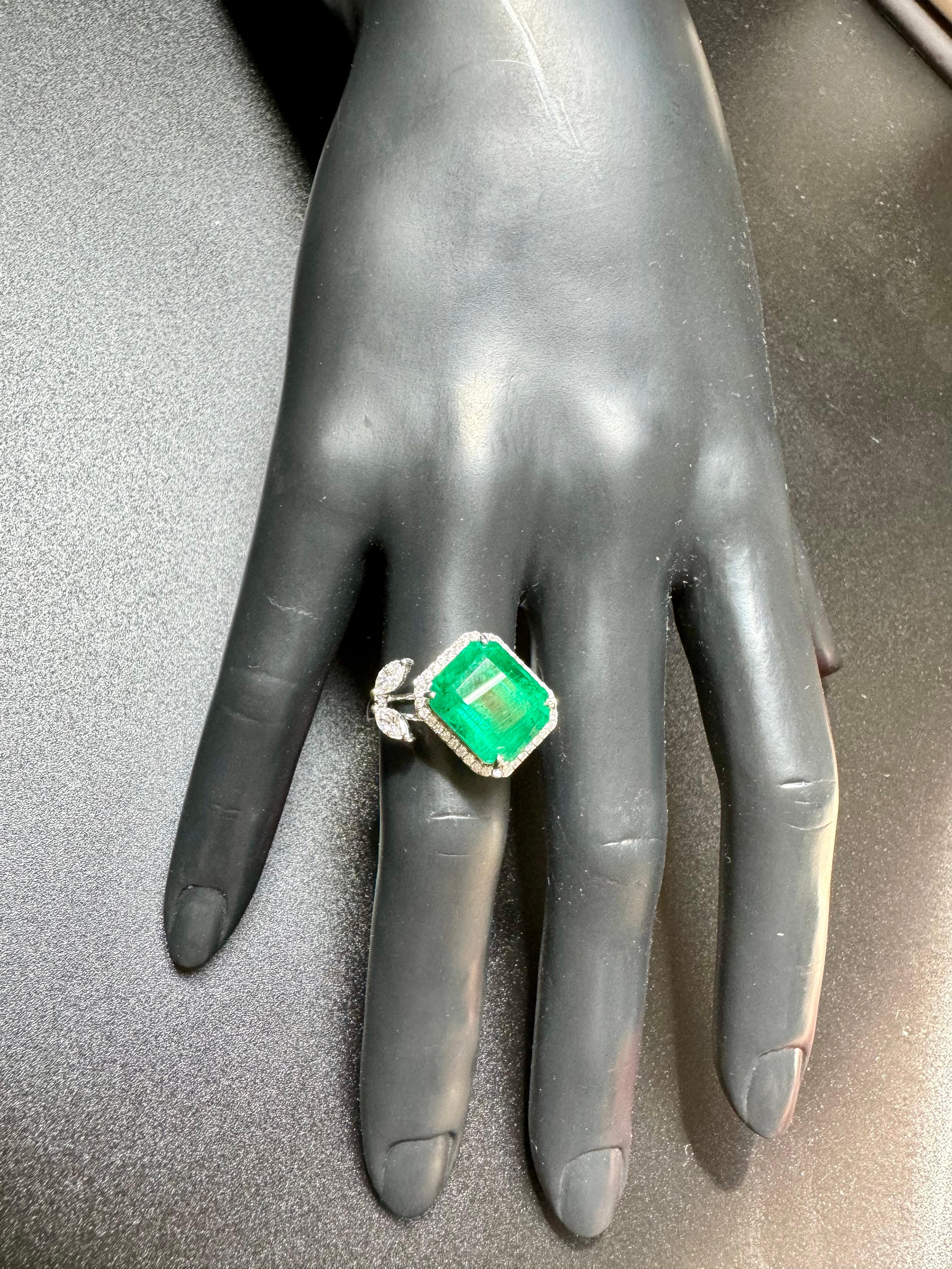 8.41 Ct Finest Emerald in Emerald cut Shape & 0.53 Ct Diamond Ring in 18 Kt Gold Size 7
Its a brand new Piece
A Classic, bypass Emerald cut emerald ring featuring a stunning 8.41 Ct finest Zambian emerald. This exquisite emerald is highly desirable