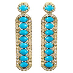 8.427 Carat Turquoise Drop Earring in 18KYG with Opal & White Diamond.